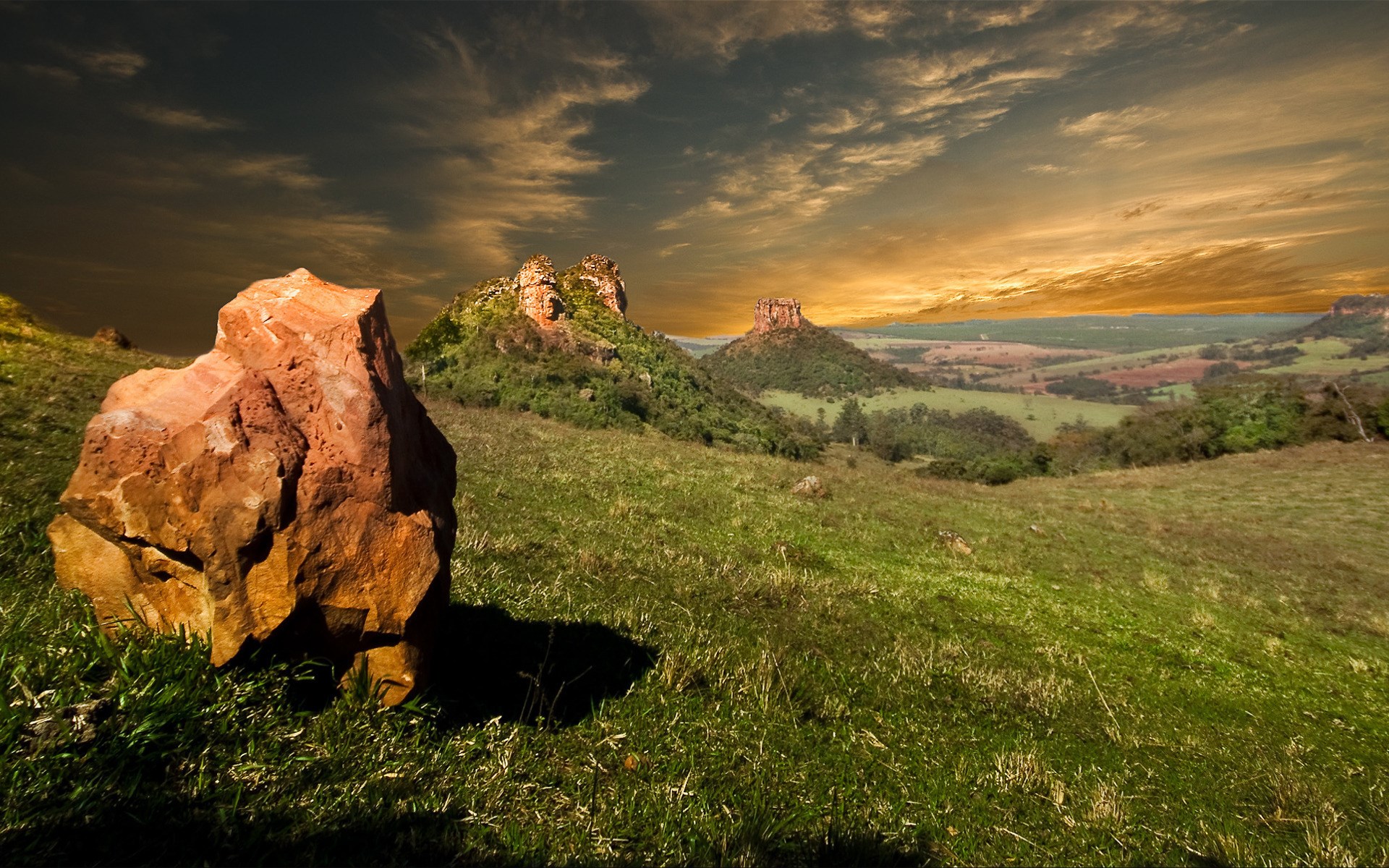 Rocky landscape with mesas at sunset HD Wallpaper