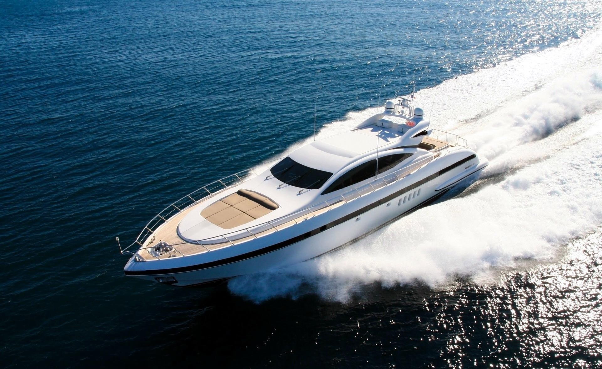 White yacht cruising on blue water HD Wallpaper