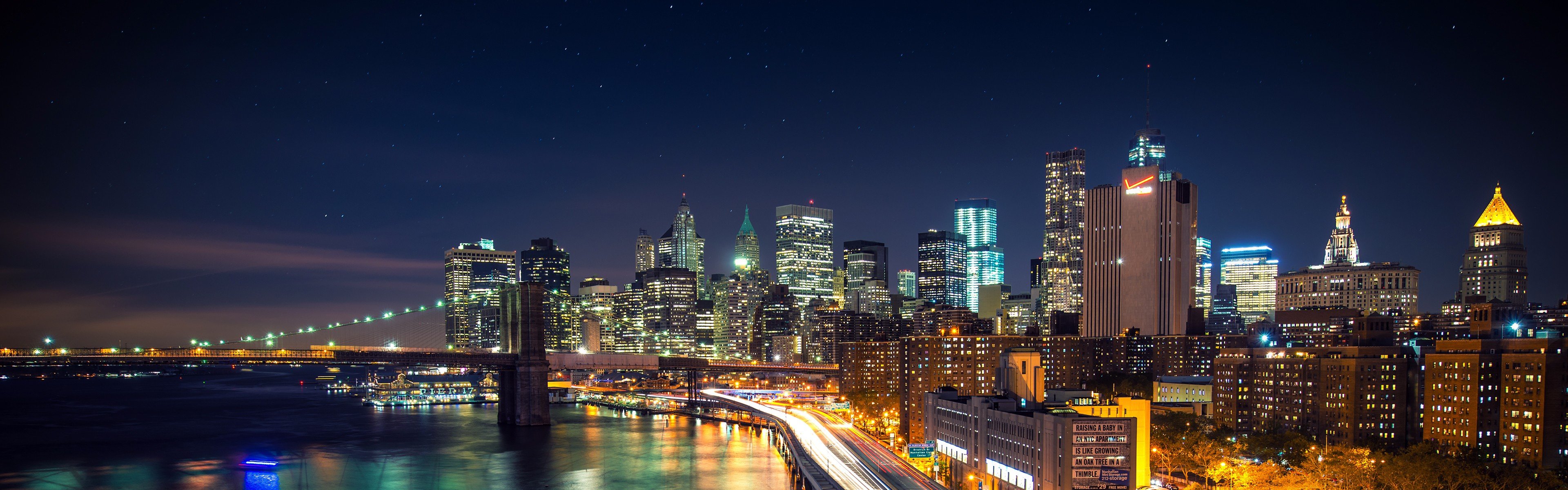 New York City skyline and Brooklyn Bridge at night HD Wallpaper