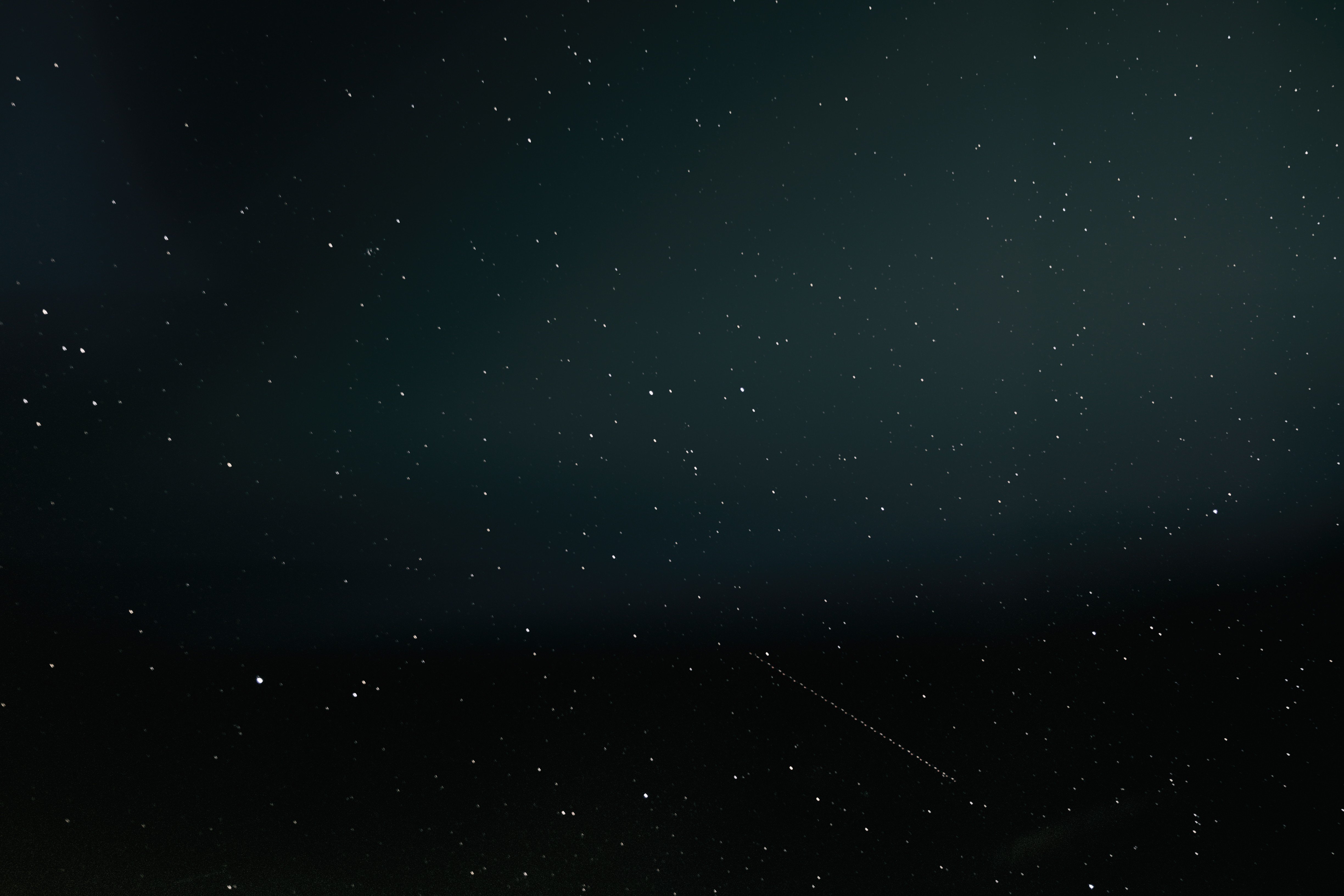 Star trails in the night sky HD Wallpaper