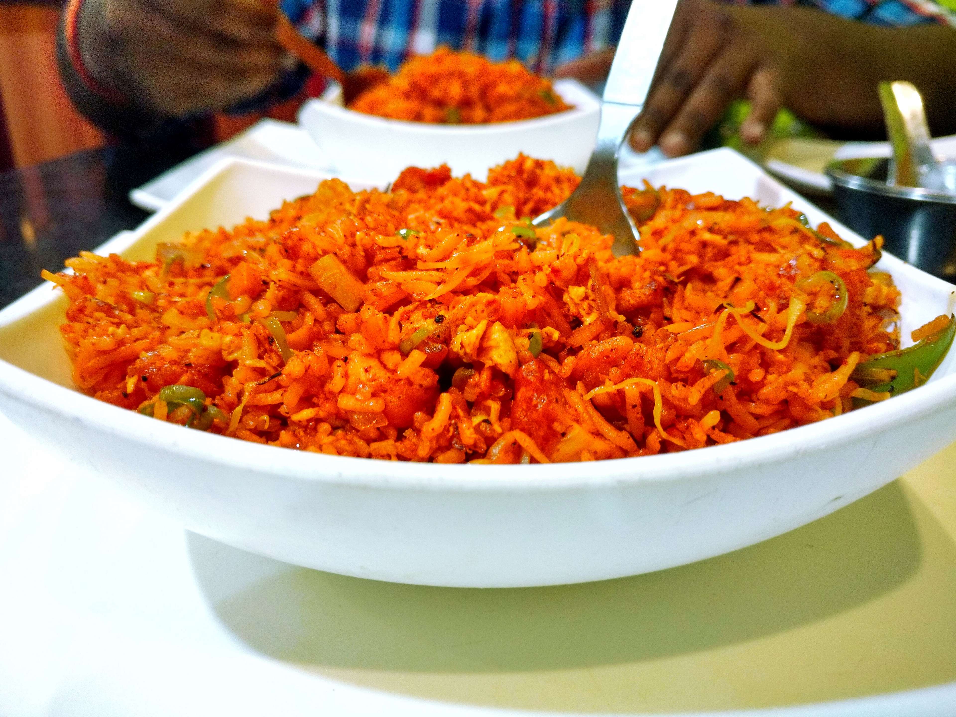 Spicy Indian Fried Rice in a White Bowl HD Wallpaper
