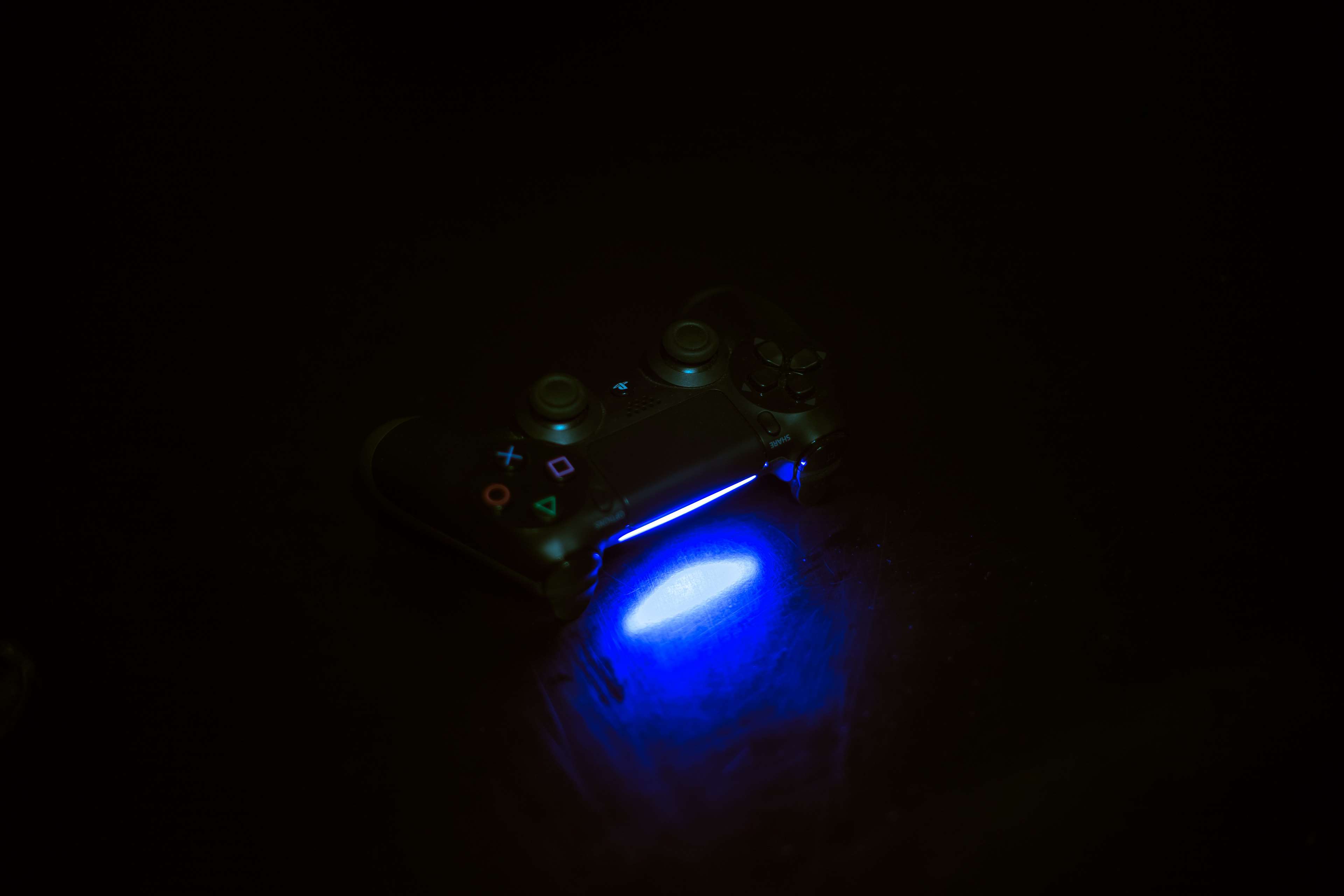 Playstation 4K controller with blue light HD Wallpaper