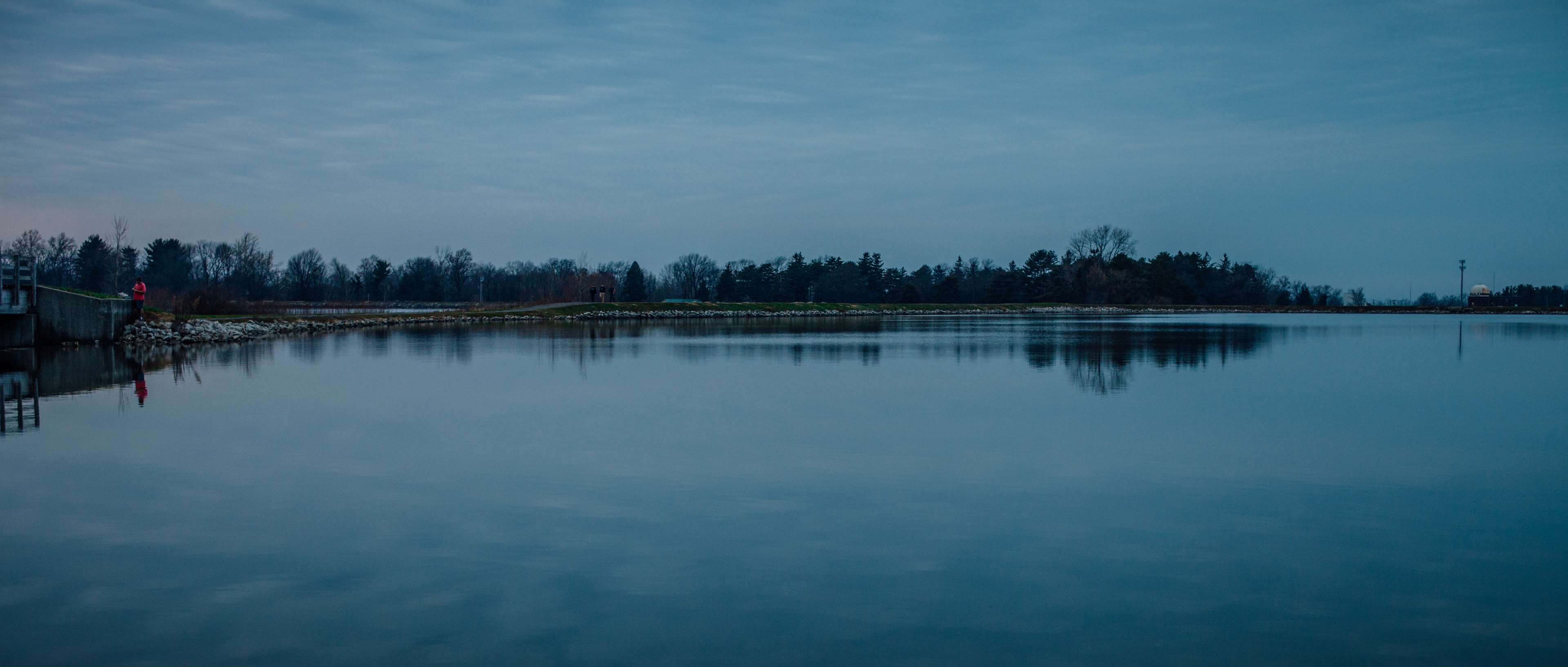Calm reservoir with trees and sky reflection HD Wallpaper