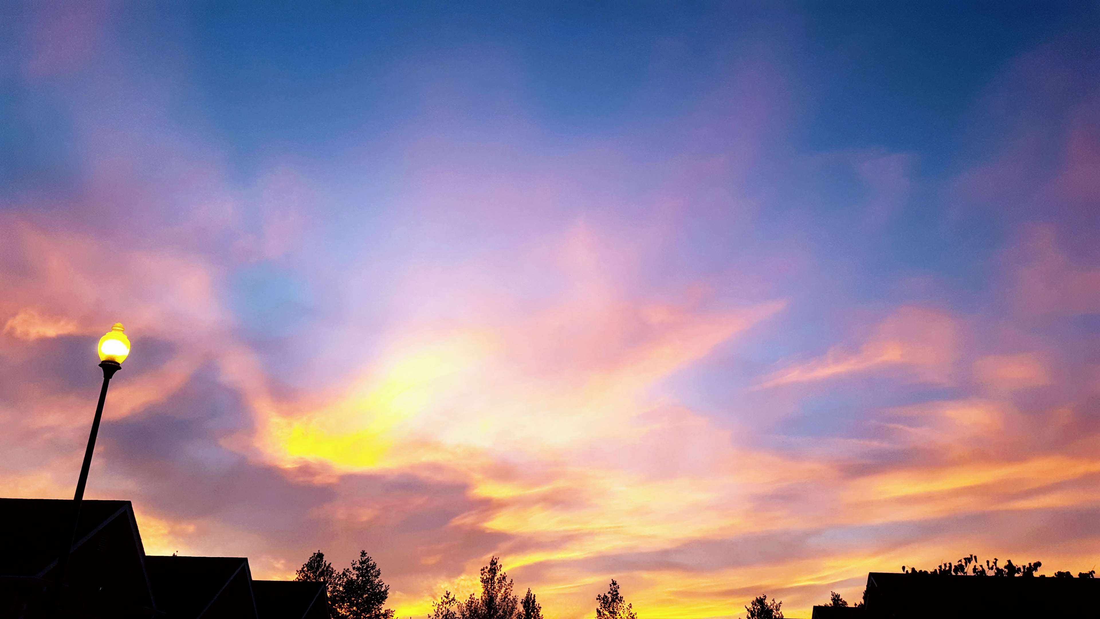 Sunset sky with clouds and street lamp HD Wallpaper