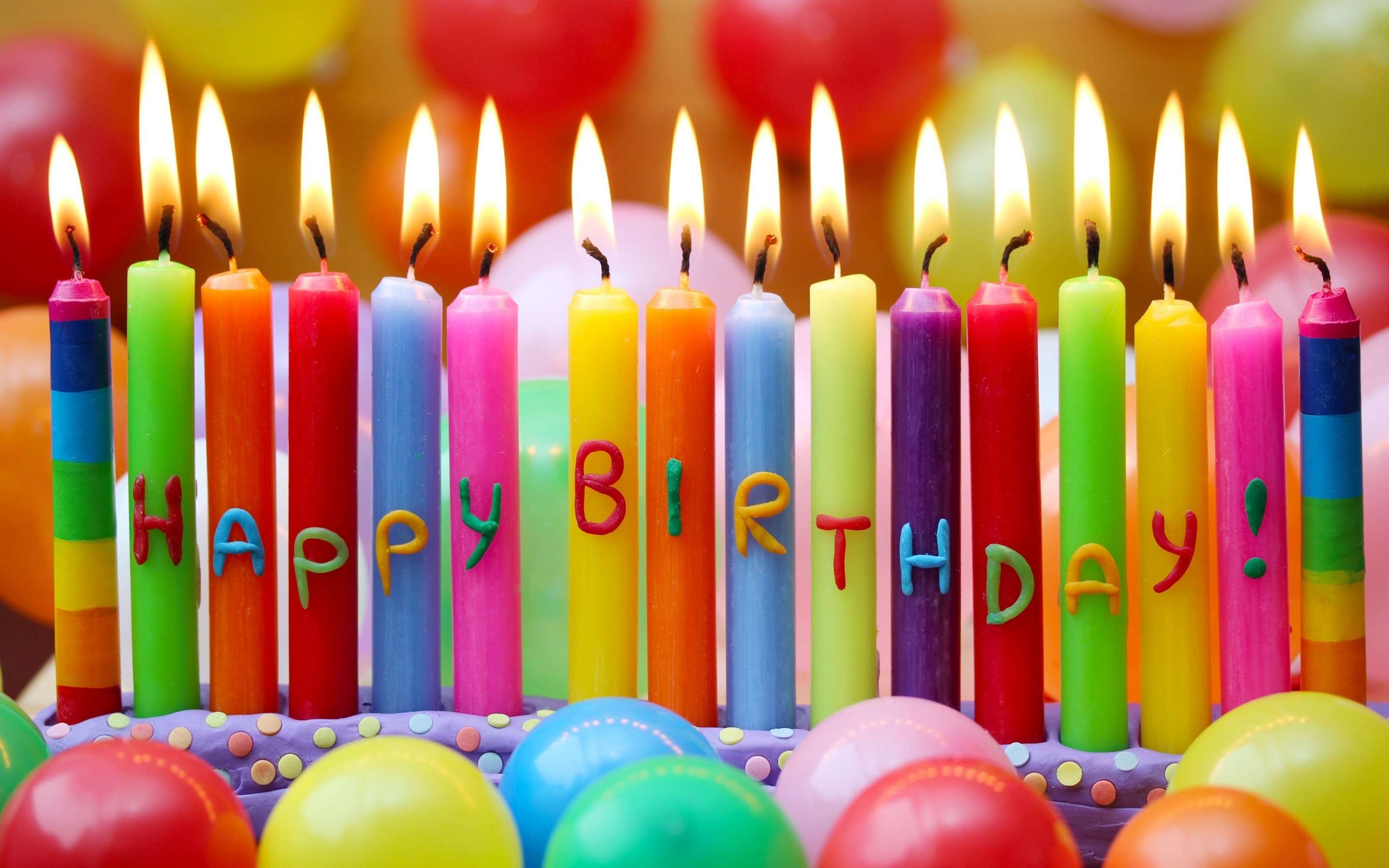 Happy Birthday candles on a cake HD Wallpaper