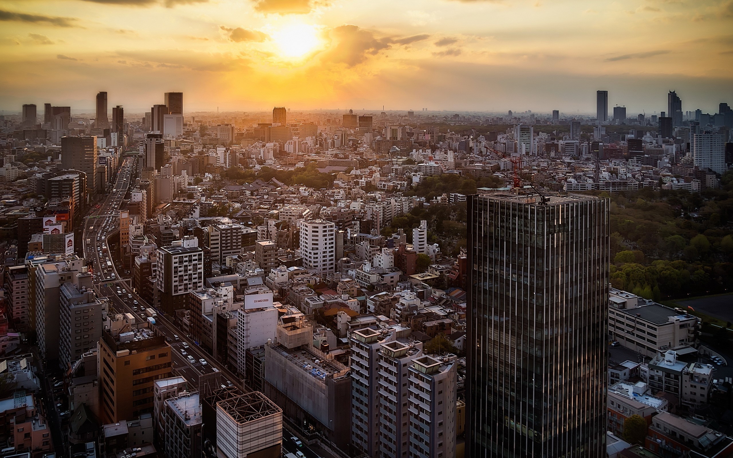 Cityscape with skyscrapers at sunset HD Wallpaper