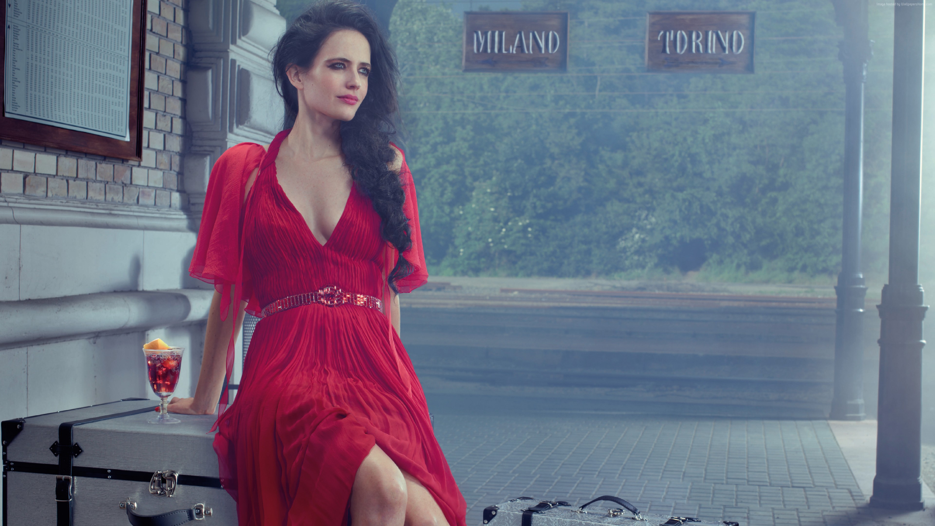 Eva Green at a train station with luggage HD Wallpaper