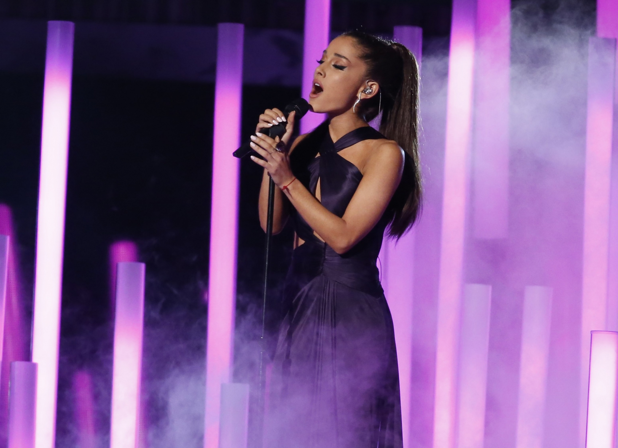 Ariana Grande performing on stage HD Wallpaper