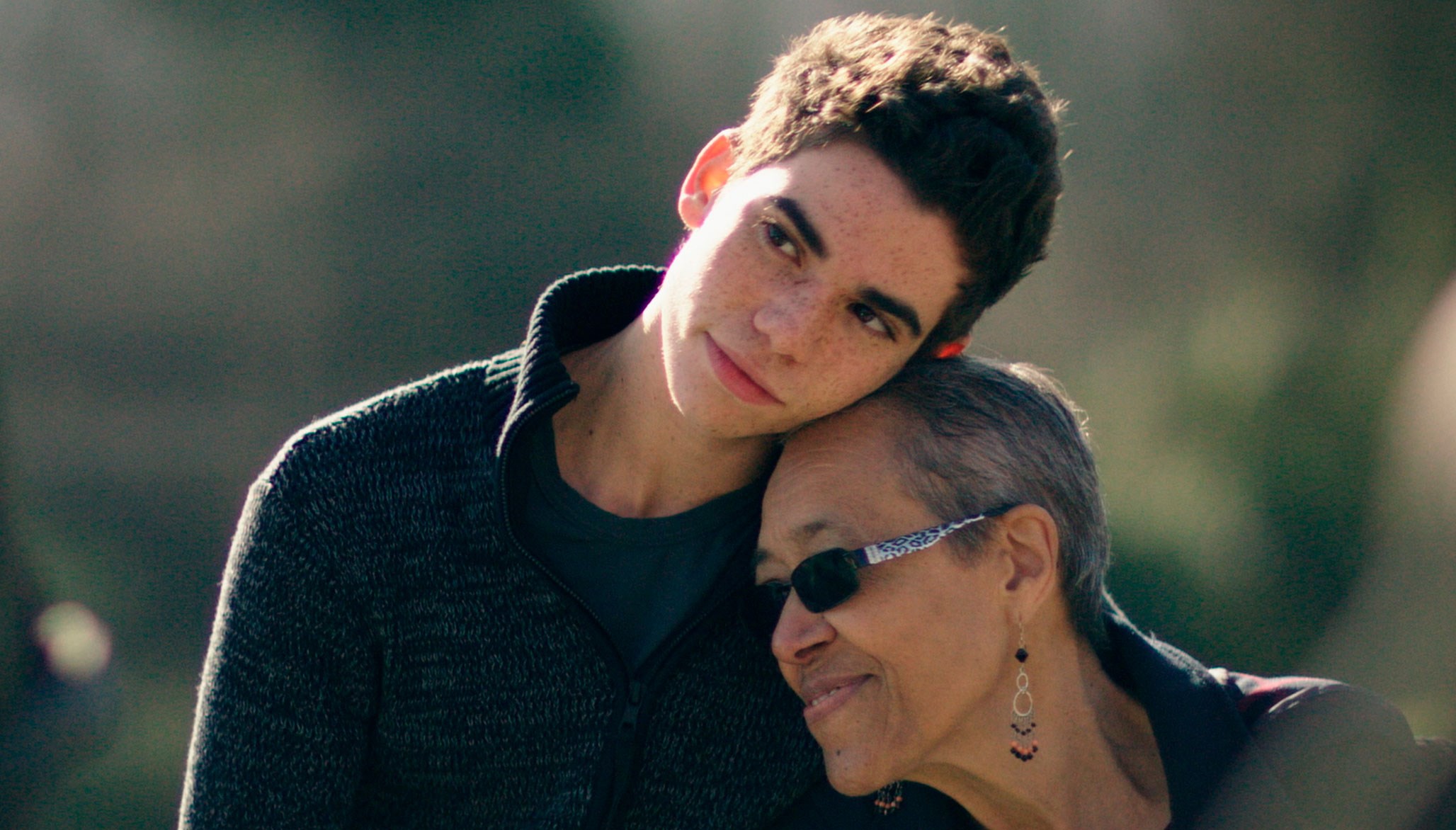 Cameron Boyce and an older woman HD Wallpaper
