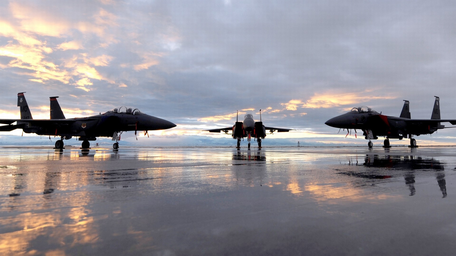 McDonnell Douglas F-15 Eagle fighter jets on tarmac HD Wallpaper