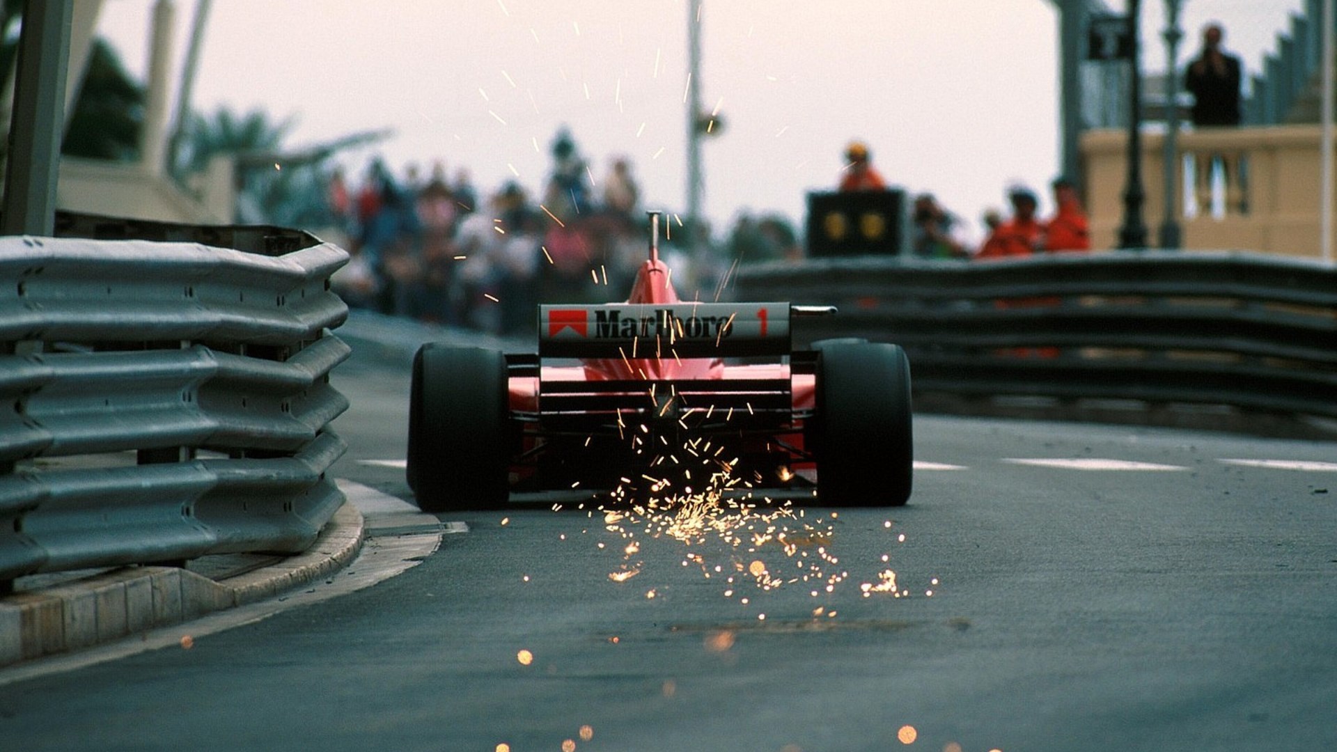 Ferrari F1 car sparks on track HD Wallpaper