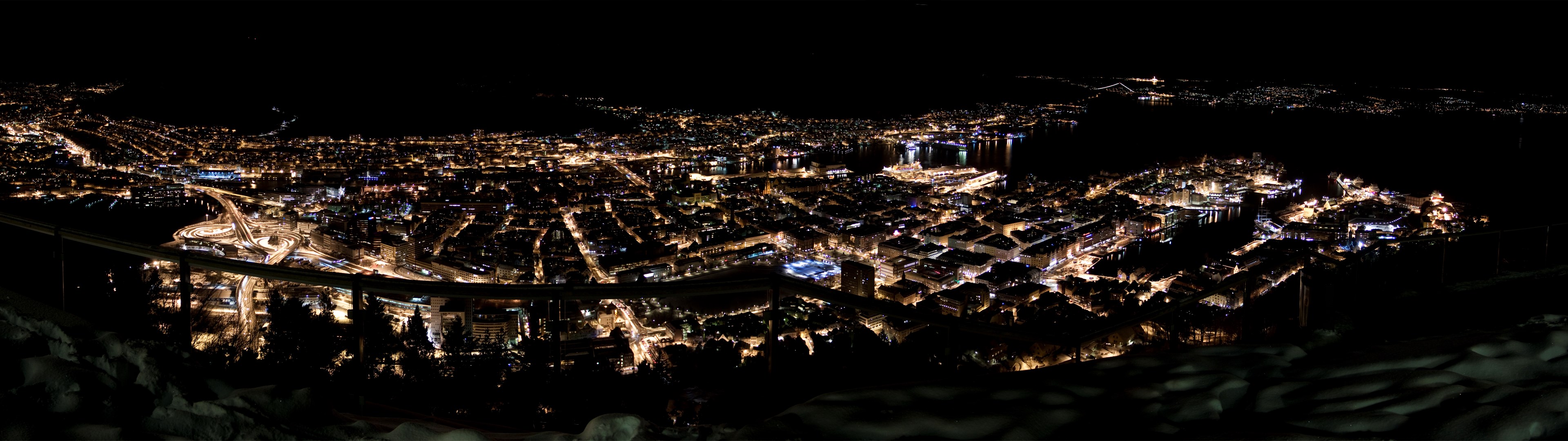 Cityscape at Night with Harbor and Mountains HD Wallpaper