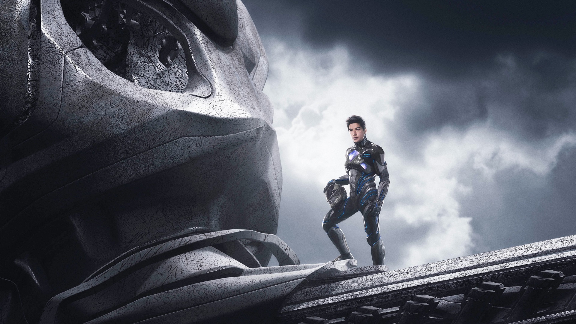 Man in Black Ranger Suit Standing Near Giant Robot Head HD Wallpaper
