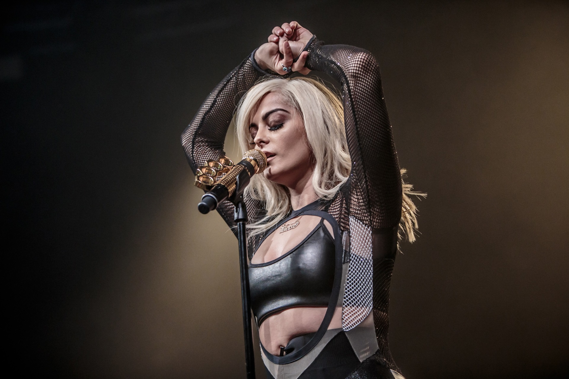 Bebe Rexha performing on stage HD Wallpaper