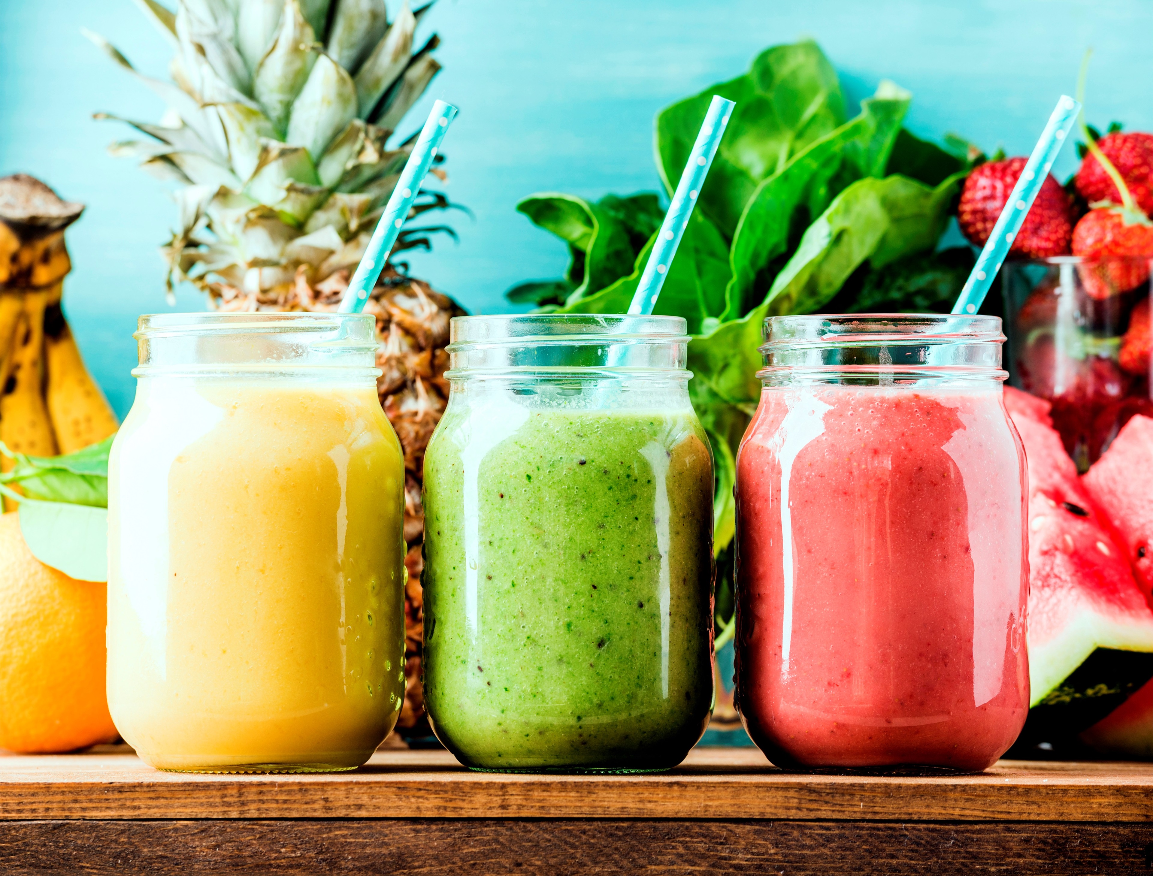 Three colorful smoothies with fruits and vegetables HD Wallpaper