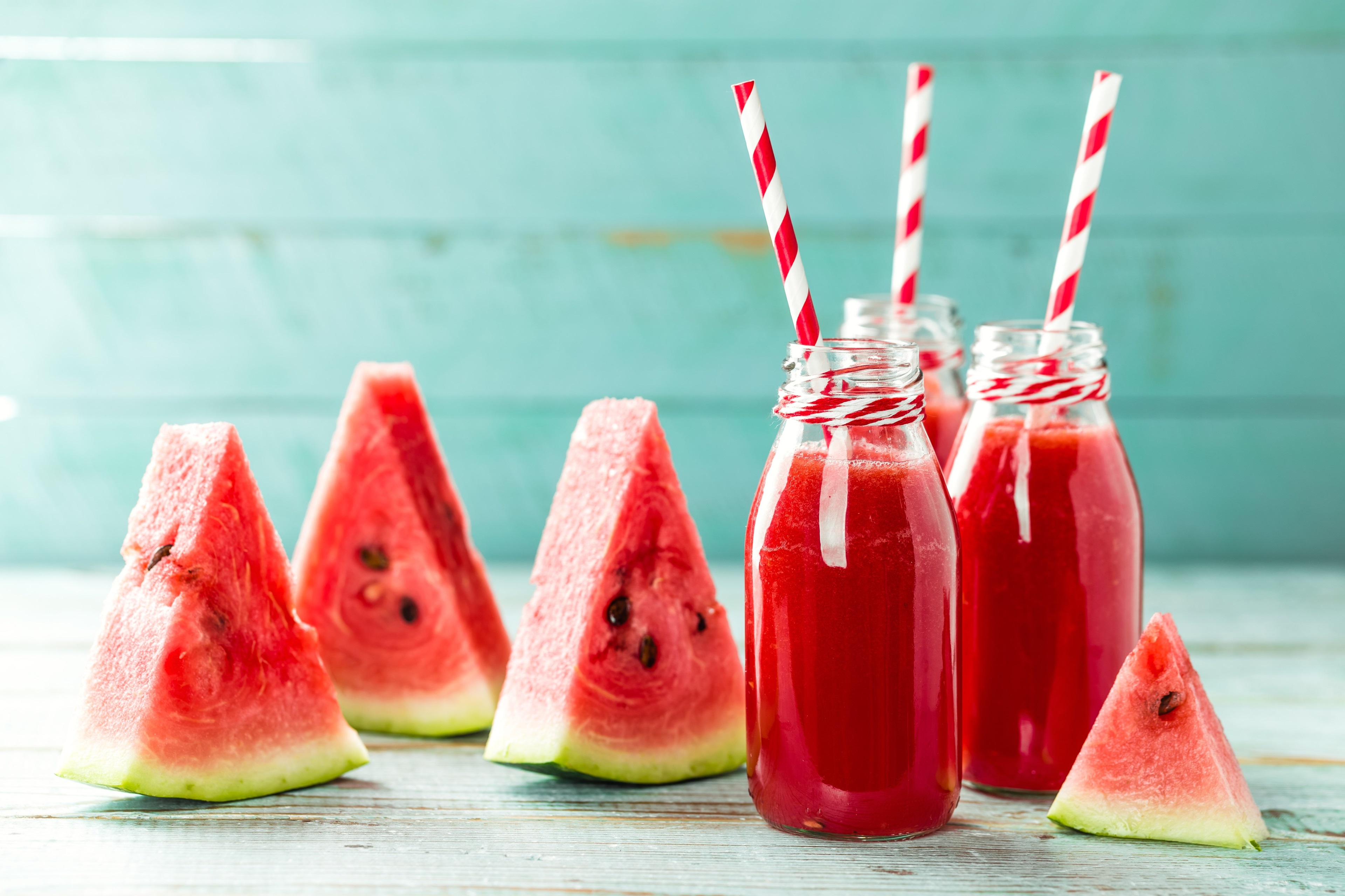 Watermelon slices and juice bottles HD Wallpaper