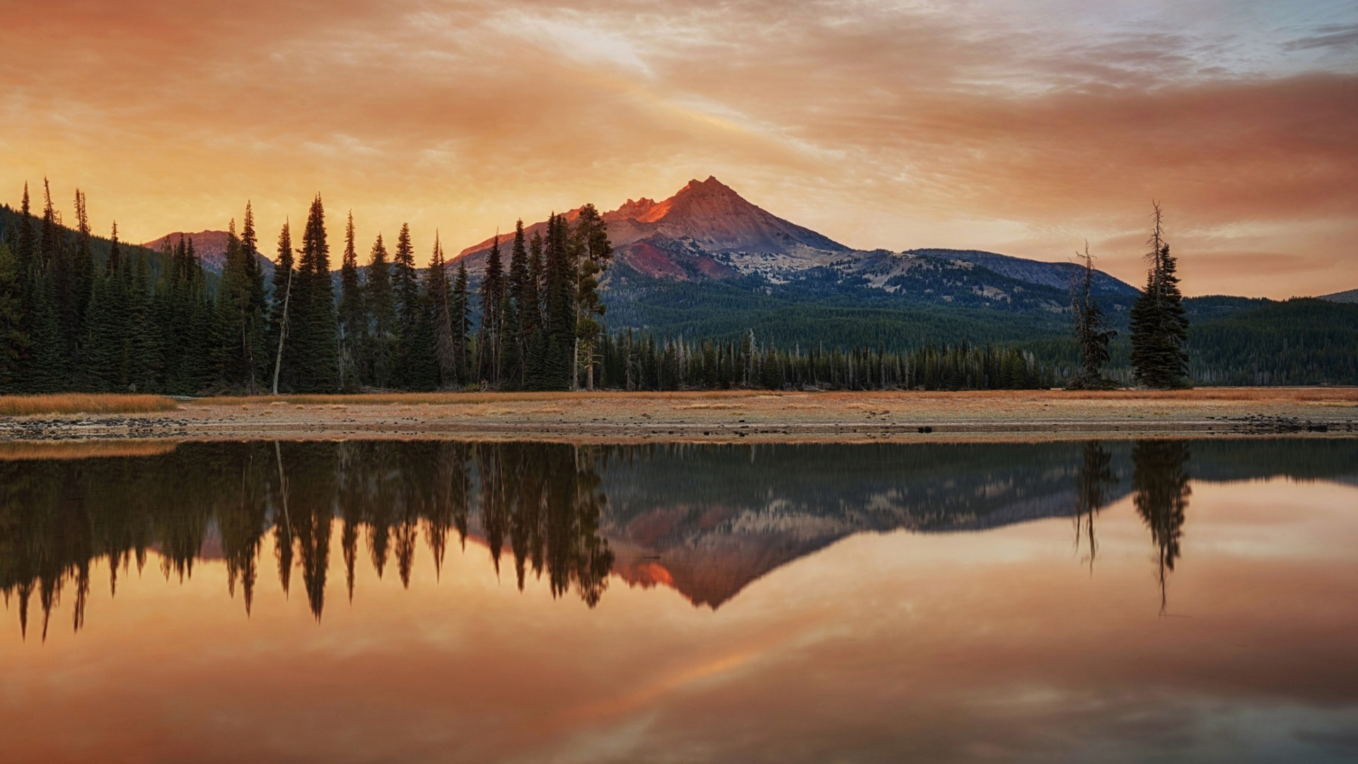Mountain reflection in lake at sunset HD Wallpaper
