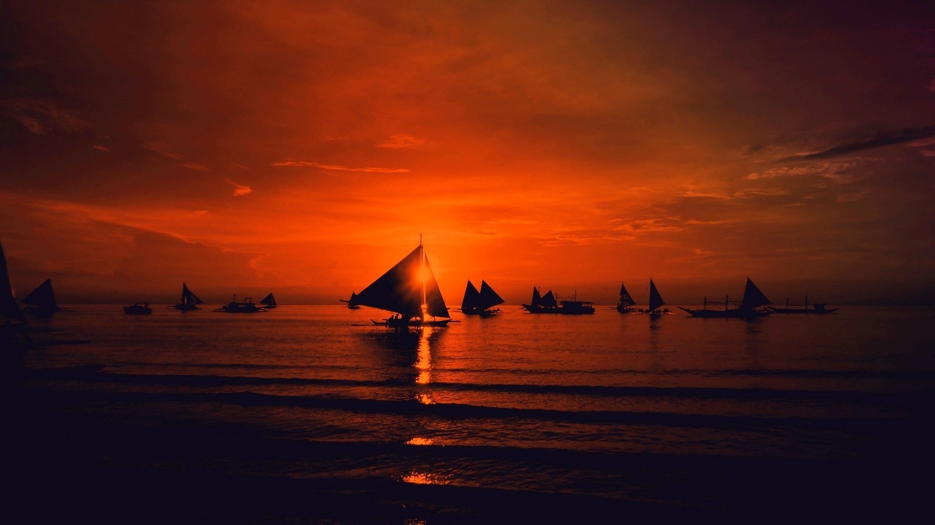 Sailboats on the sea during sunset with red sky HD Wallpaper