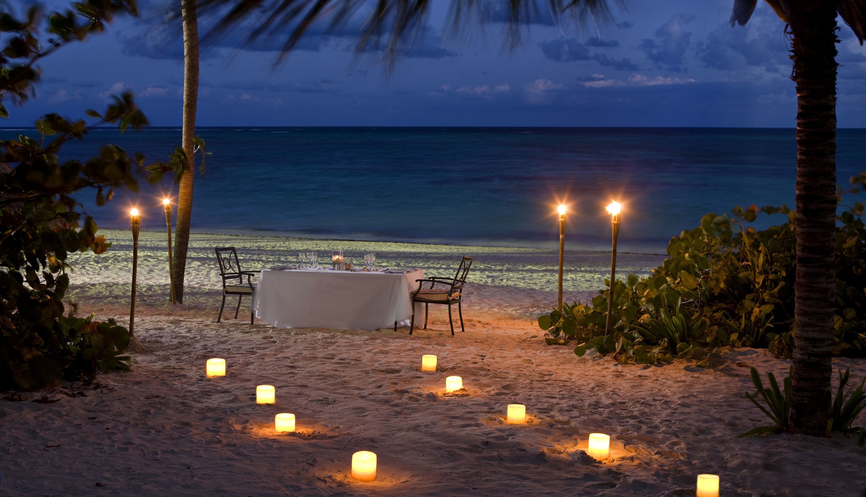 Romantic Candlelit Beach Dinner by the Sea HD Wallpaper