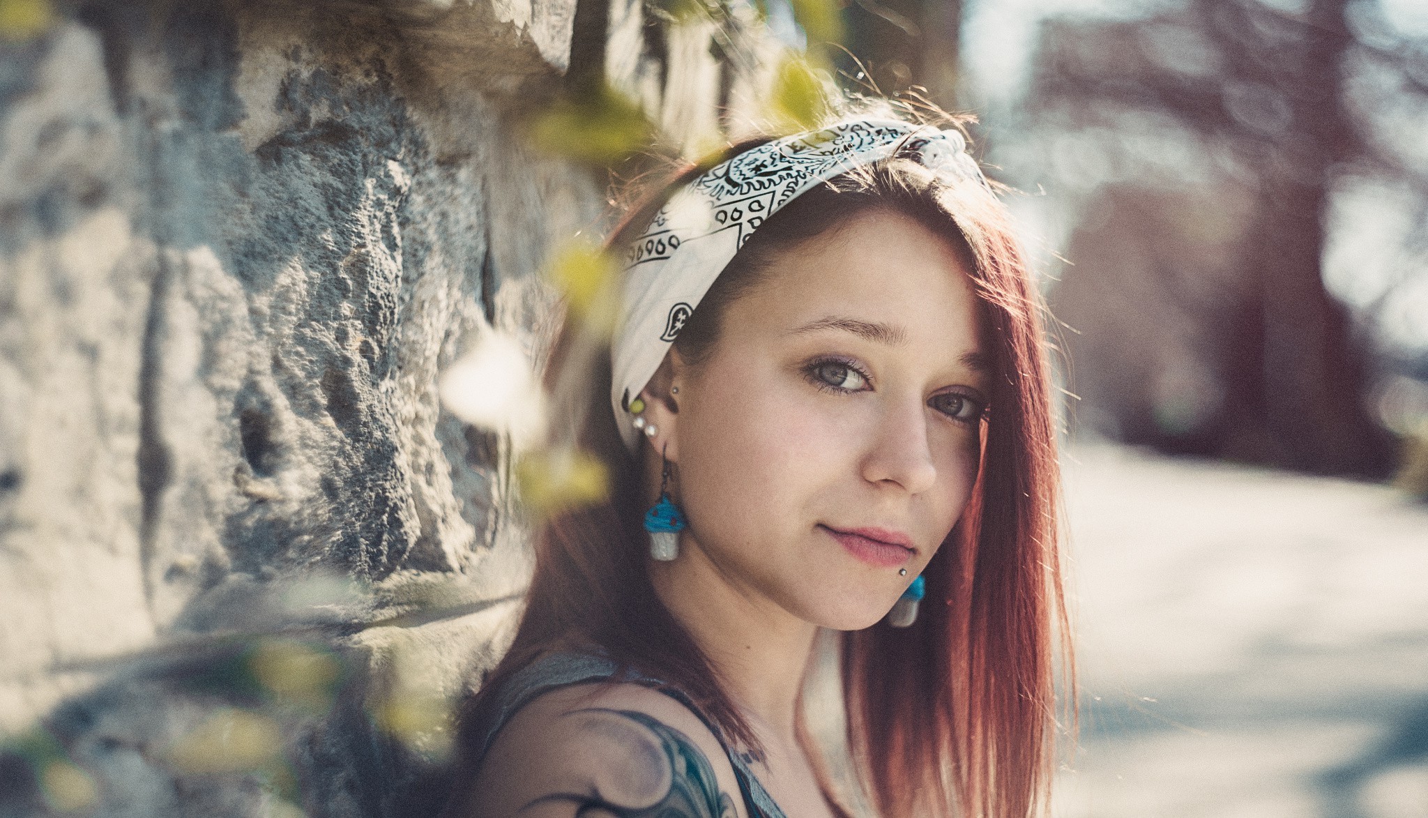 Woman with red hair and tattoos wearing a bandana HD Wallpaper