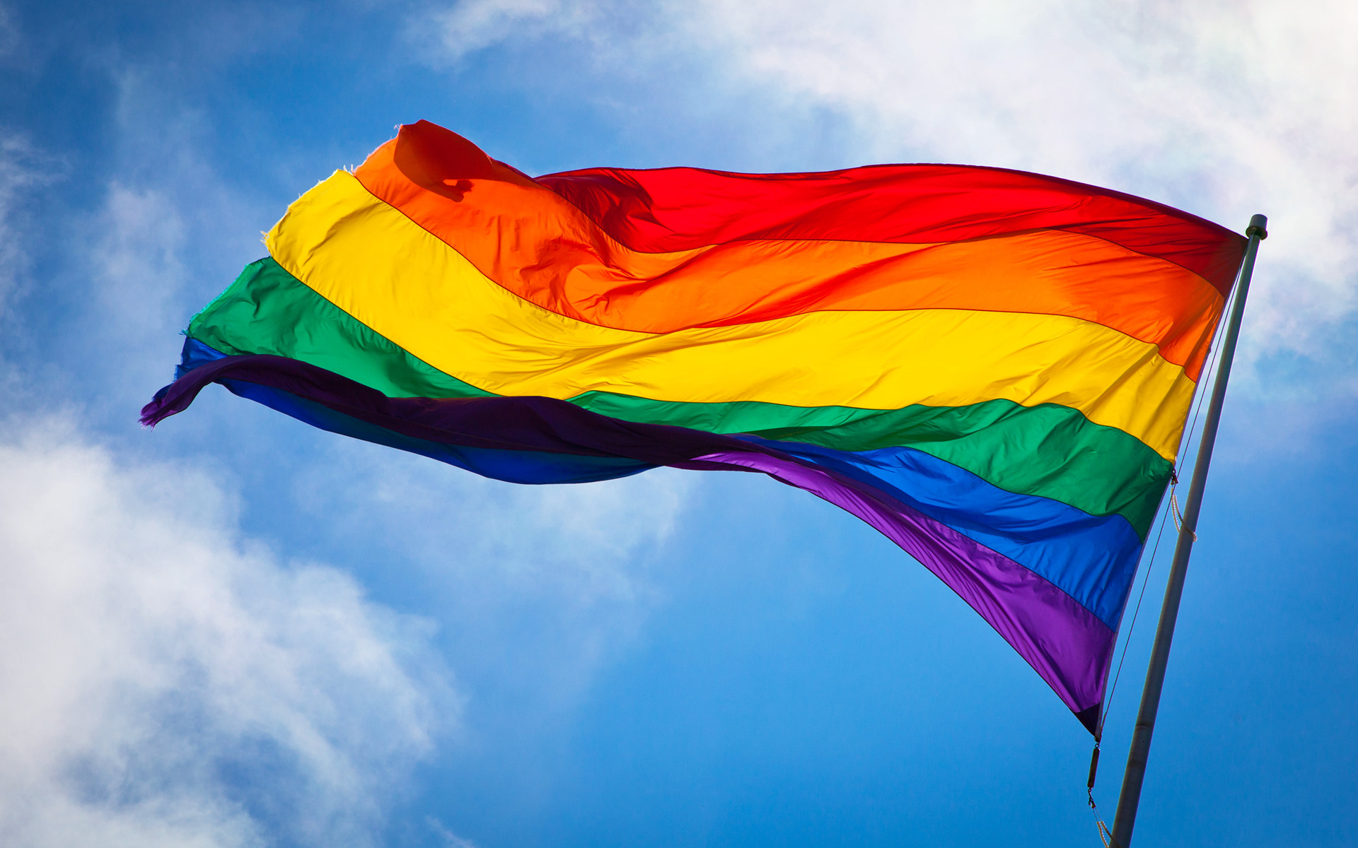 Rainbow Pride Flag Waving in the Sky HD Wallpaper