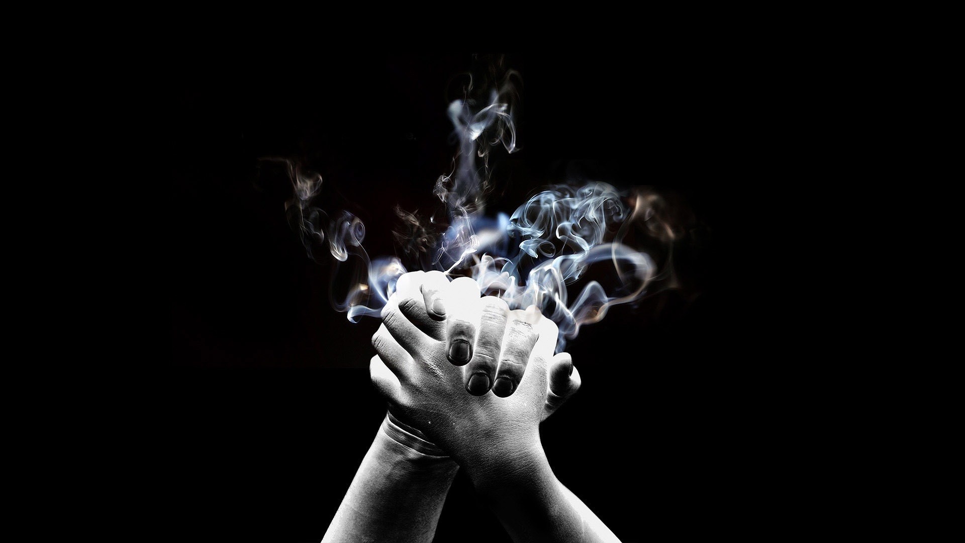 Hands clasped with smoke rising HD Wallpaper