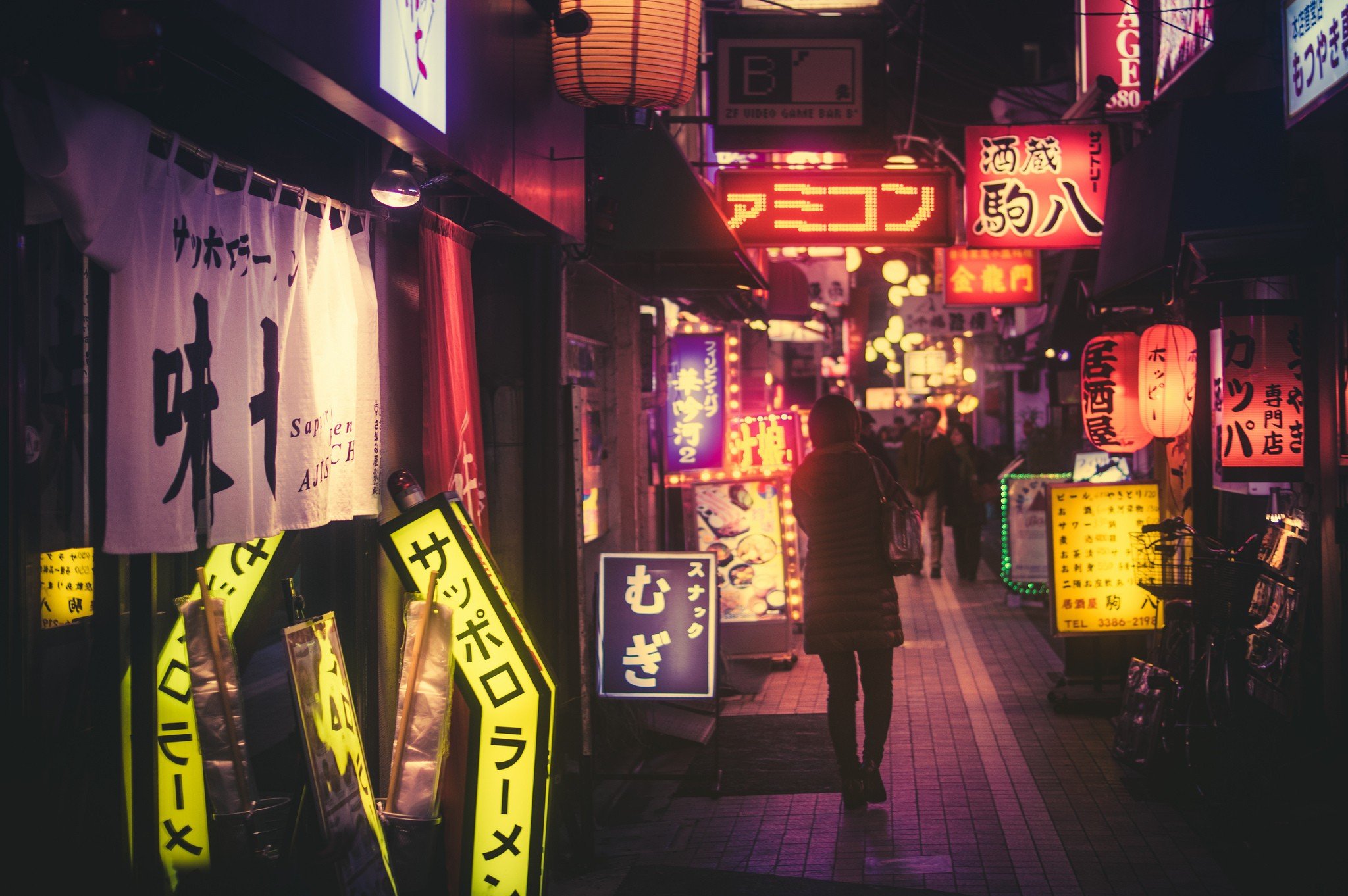 Night street with Japanese signs and a person HD Wallpaper