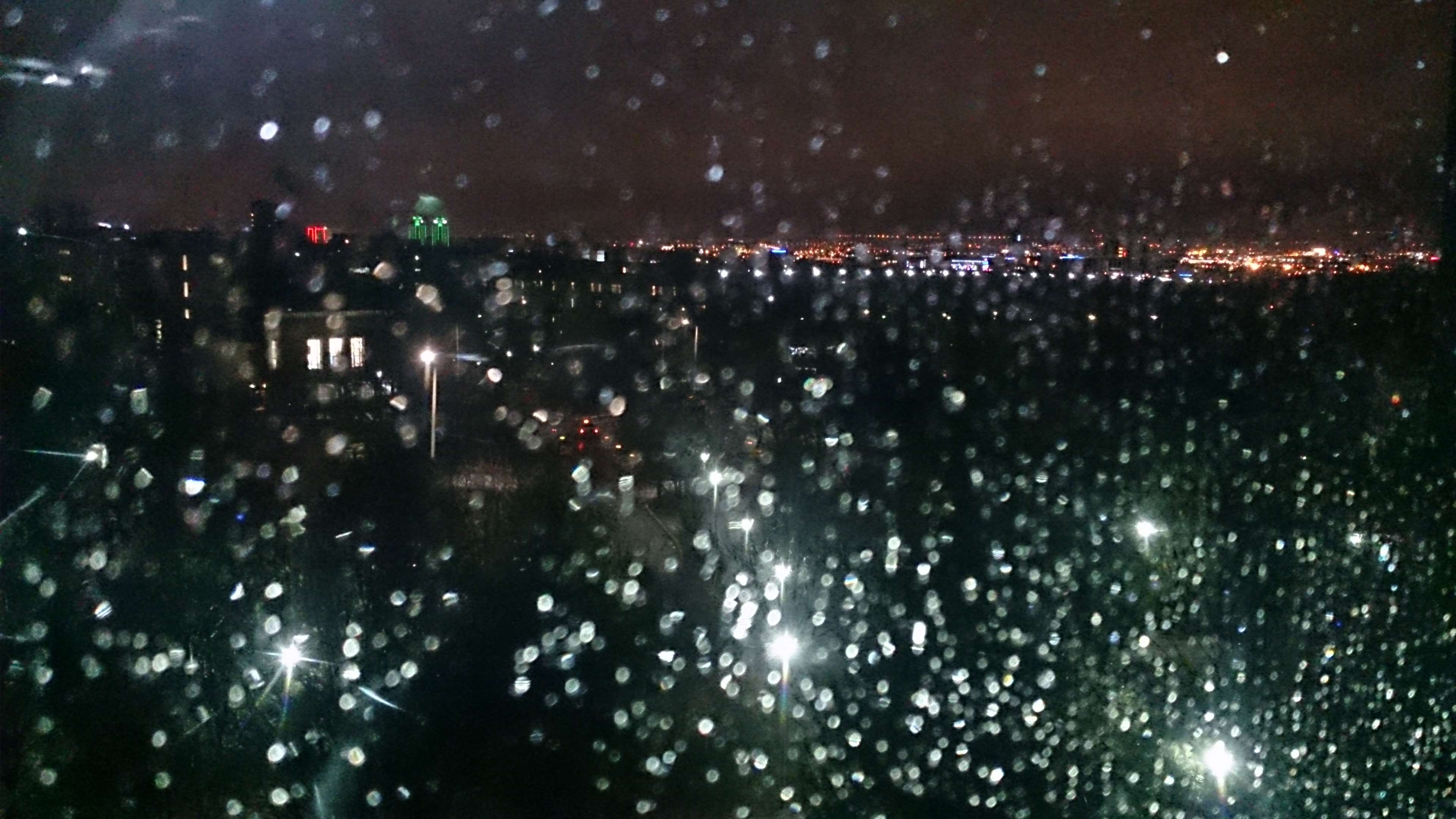 Rainy Cityscape at Night 4K HD Wallpaper
