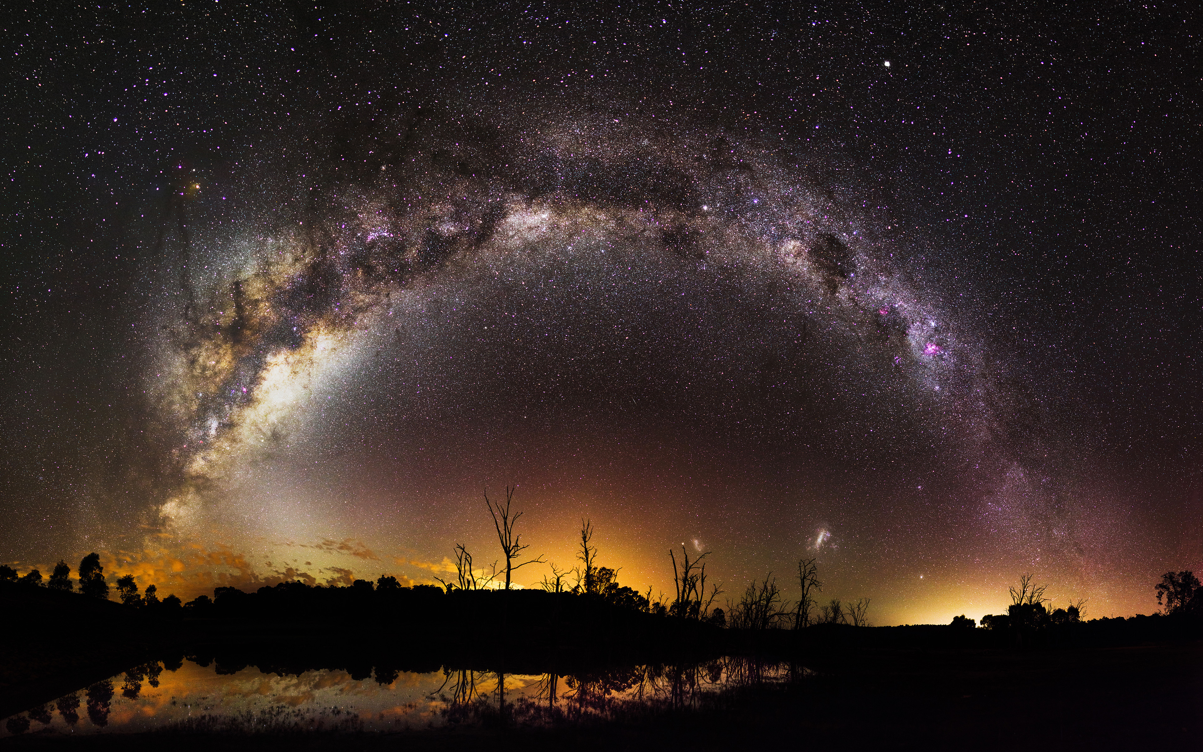 Milky Way Galaxy over a lake at night 4K HD Wallpaper