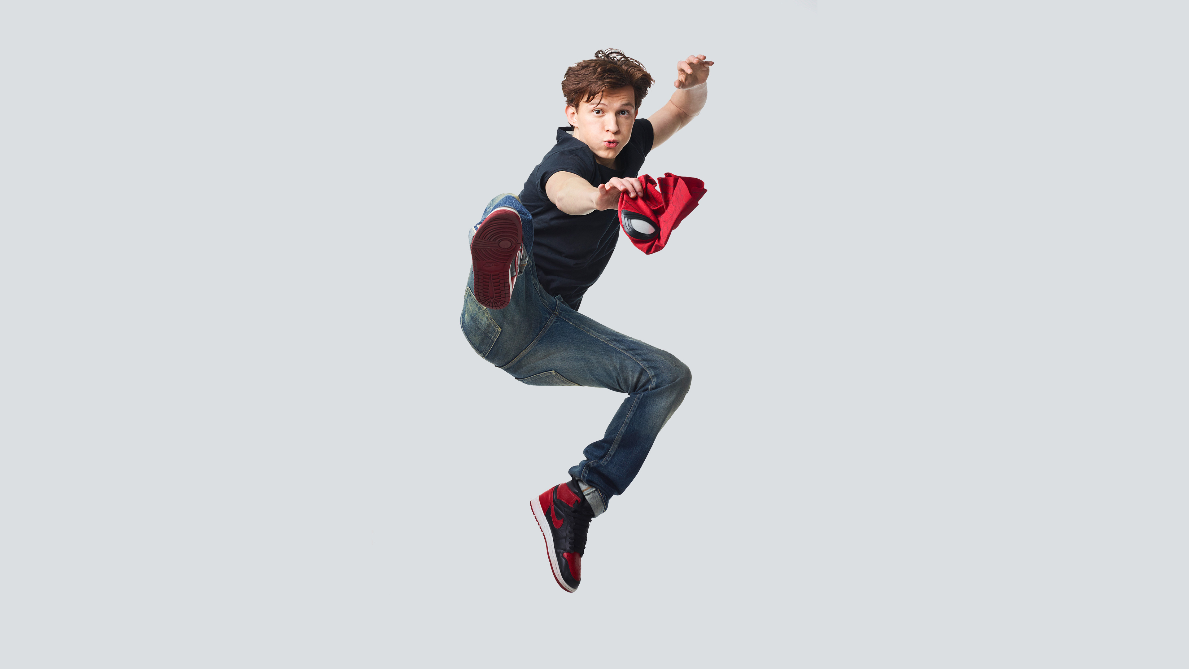Tom Holland as Spider-Man in a jump HD Wallpaper