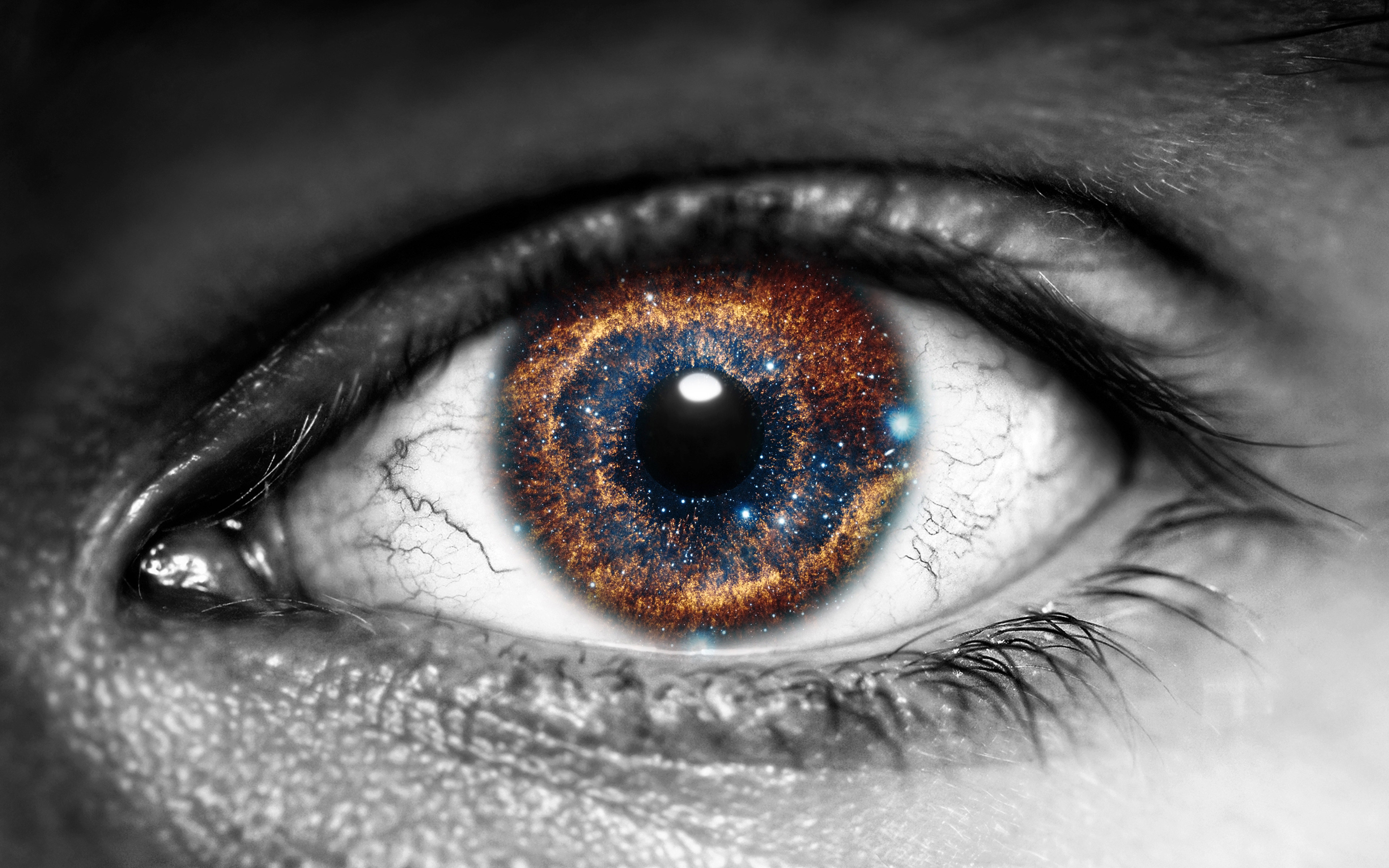 Close-up of an eye with a galaxy iris HD Wallpaper