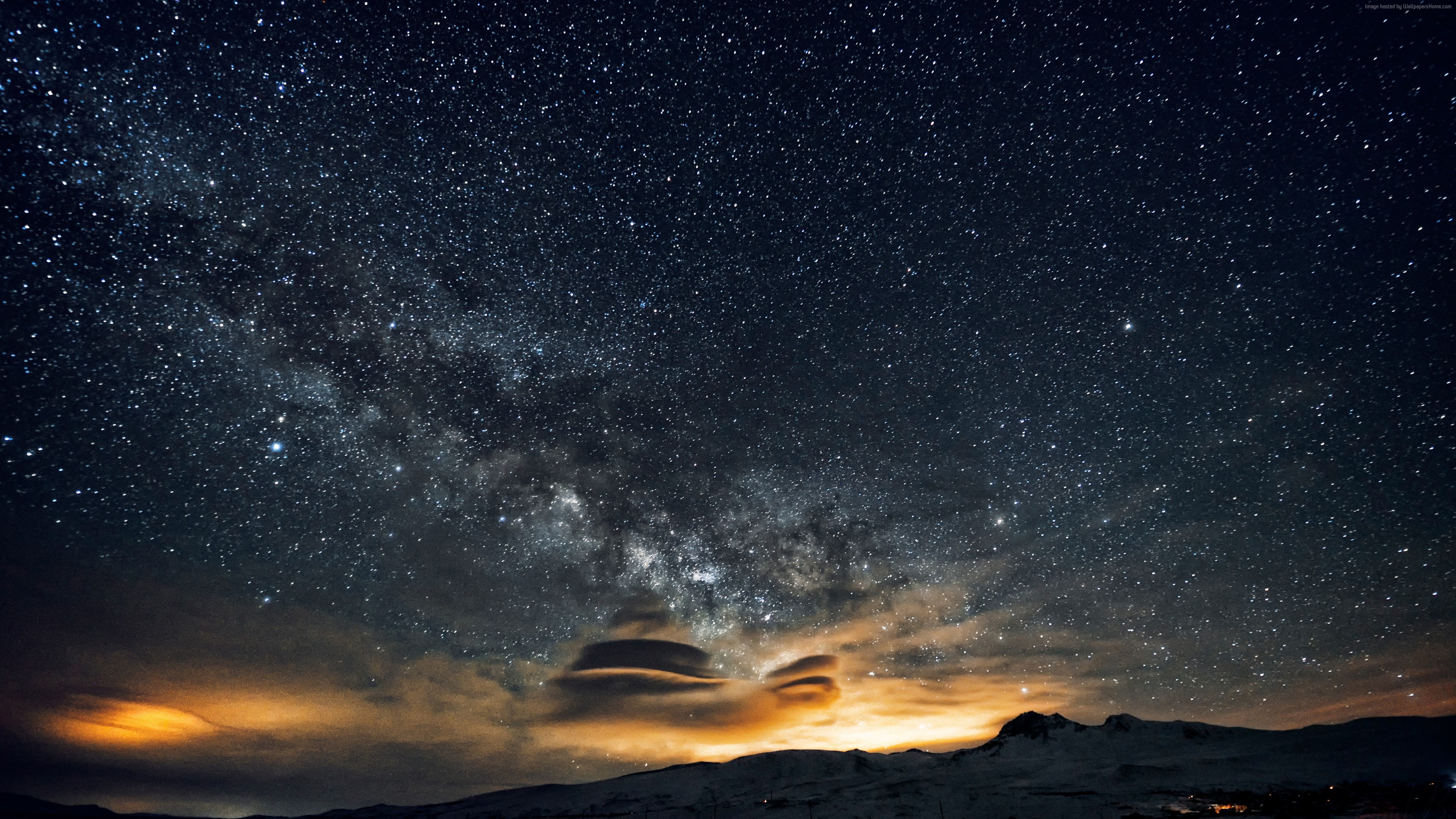 Milky Way galaxy over mountains and clouds HD Wallpaper