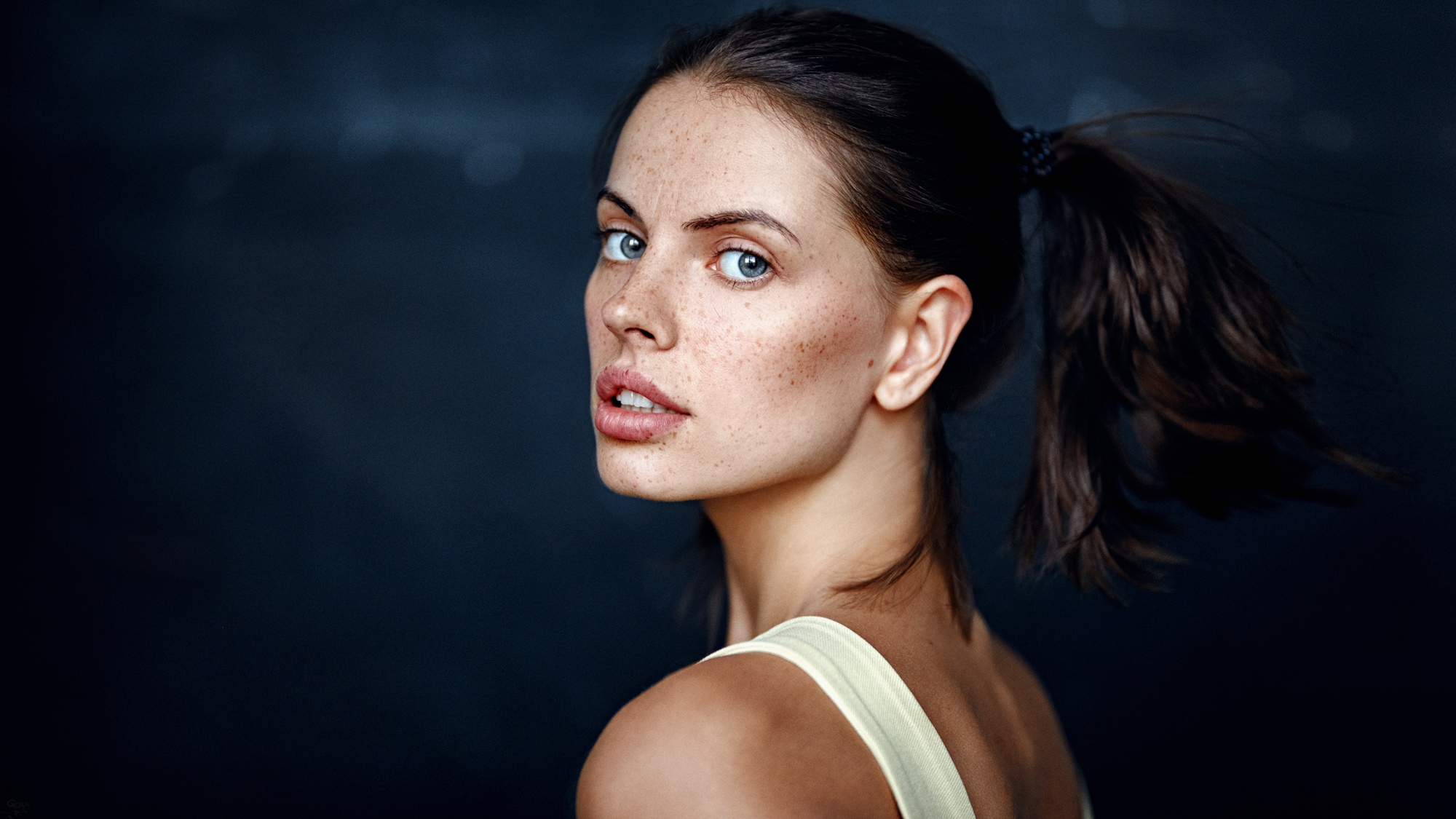 Woman with freckles and ponytail HD Wallpaper