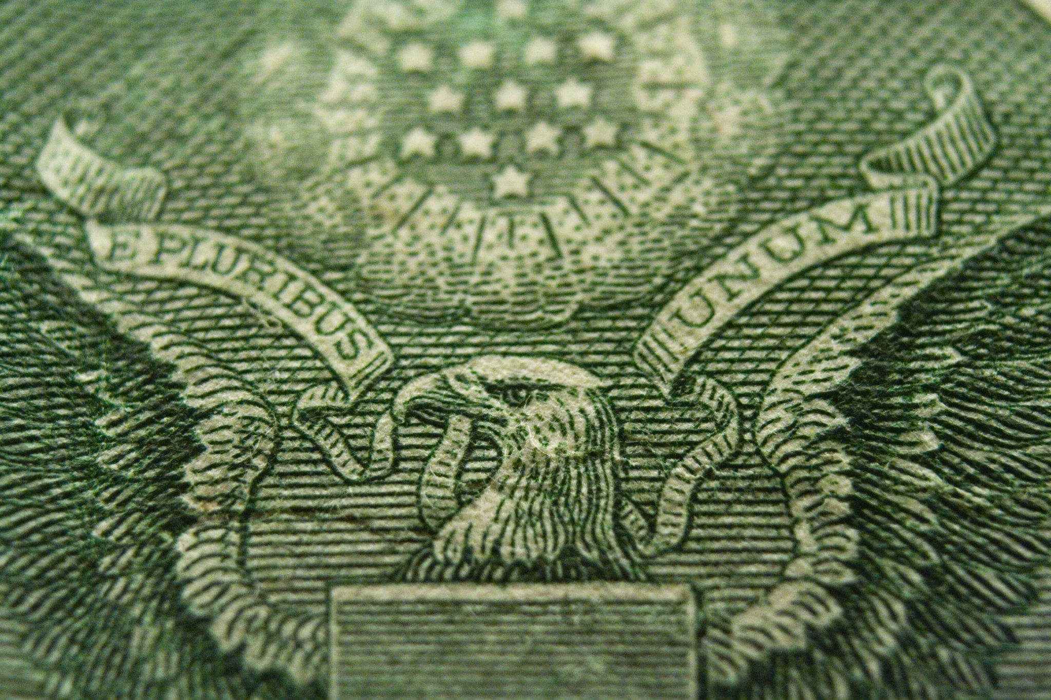 Close-up of the Great Seal of the United States on a dollar bill HD Wallpaper