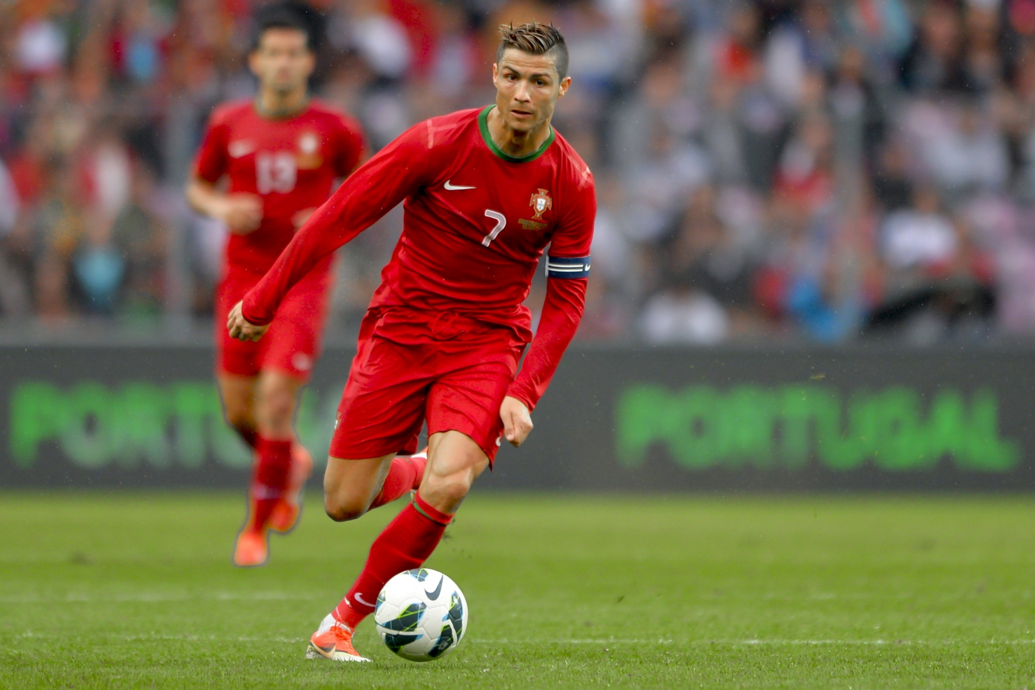 Cristiano Ronaldo playing soccer for Portugal HD Wallpaper