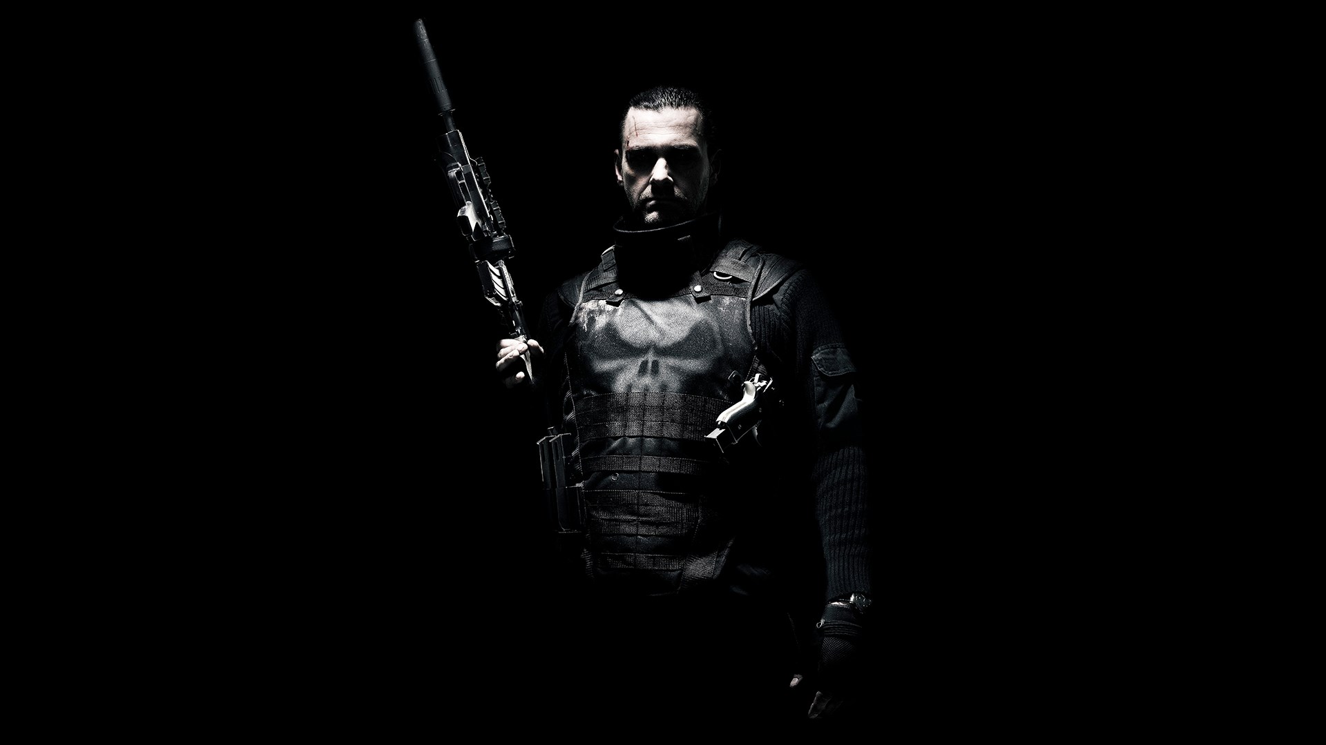 The Punisher holding a rifle HD Wallpaper