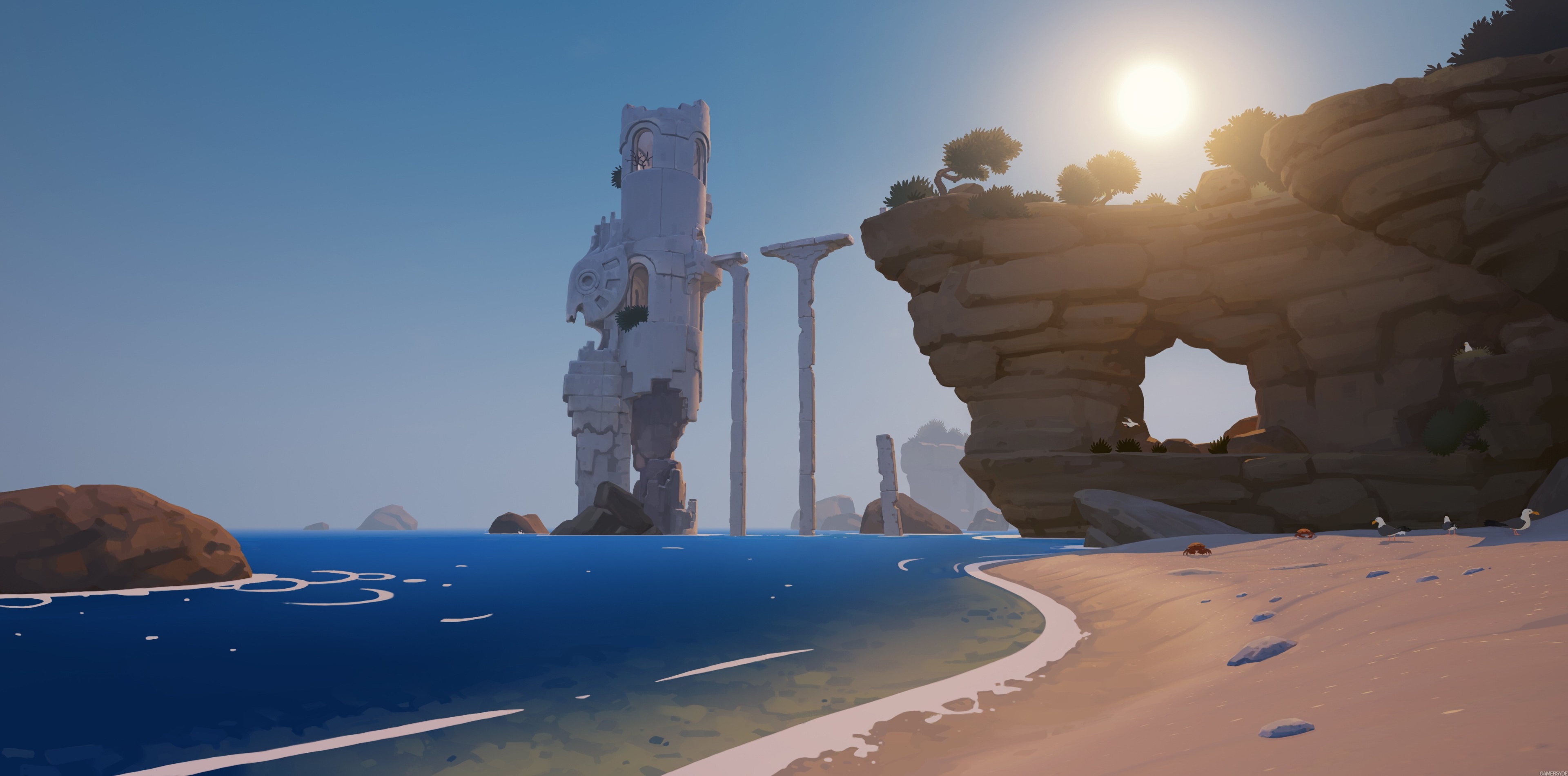 Ancient ruins on a rocky coast with the sun setting HD Wallpaper