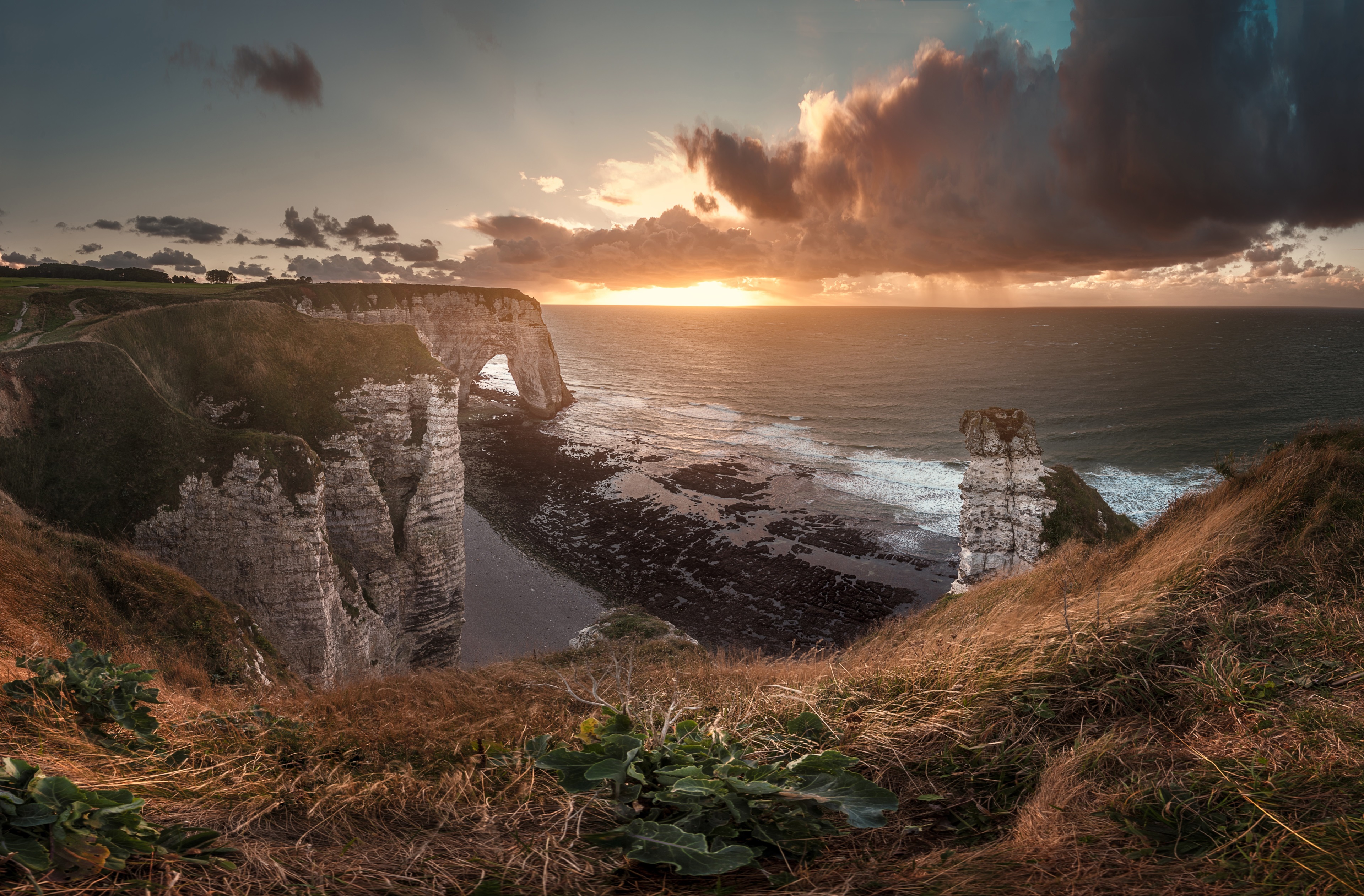 Etretat cliffs and arch at sunset HD Wallpaper