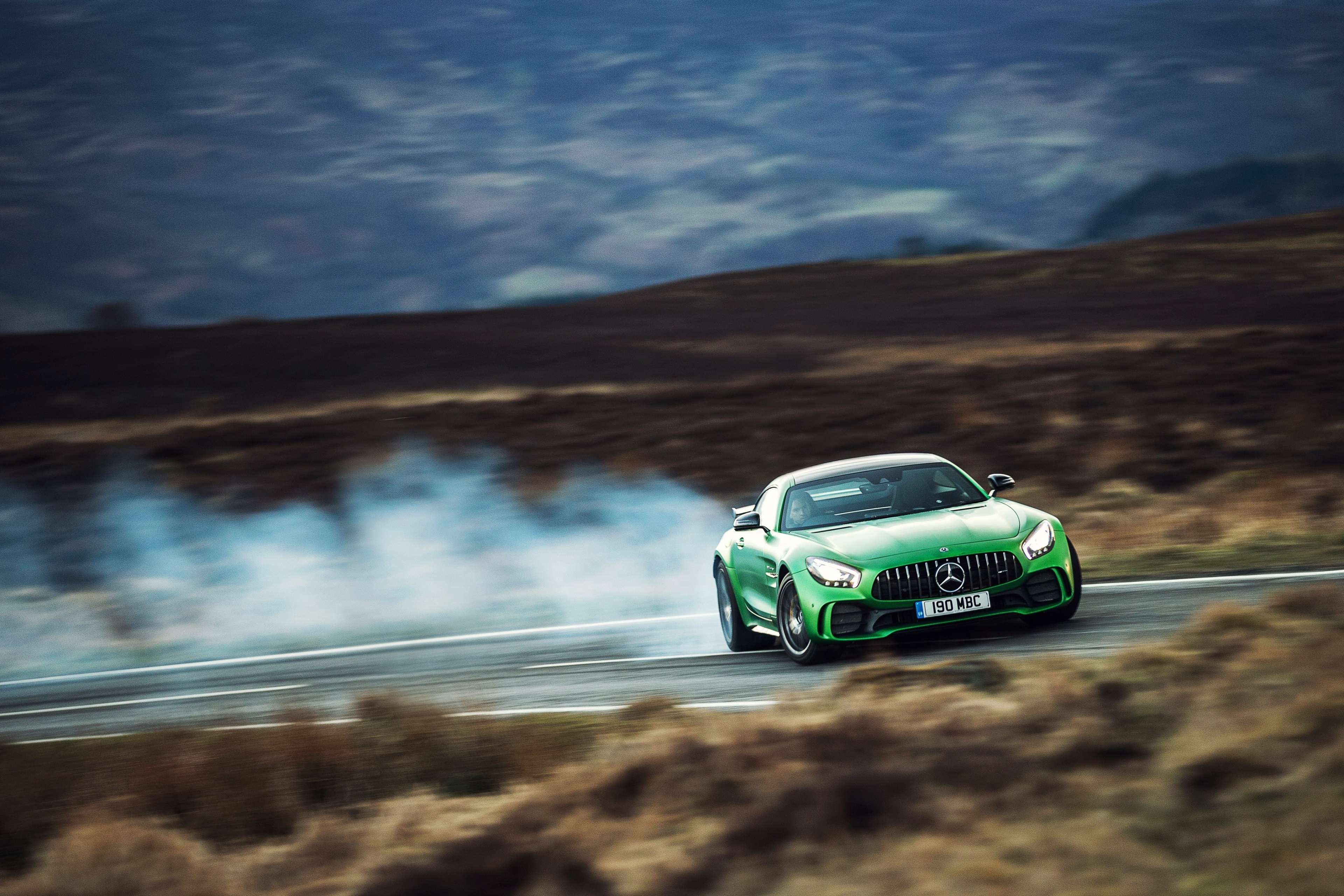 Green Mercedes-AMG GT Drifting on Mountain Road 4K HD Wallpaper