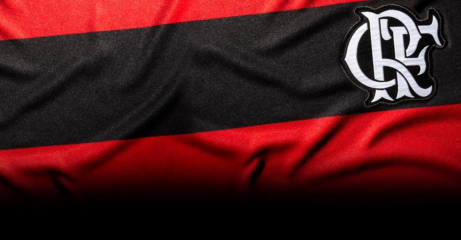 Flamengo football club logo on red and black striped fabric HD Wallpaper