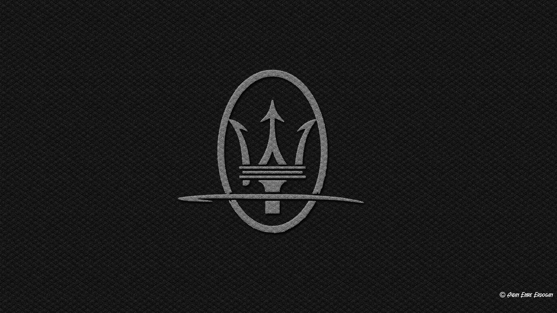 Maserati logo on carbon fiber texture HD Wallpaper