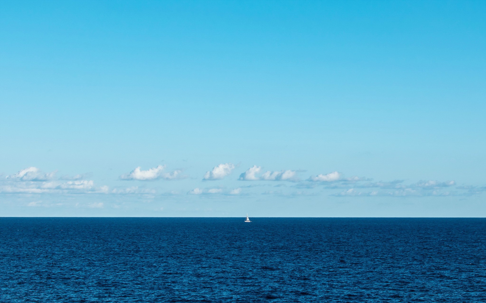 Minimalist Sea and Boat Under Clear Blue Sky HD Wallpaper