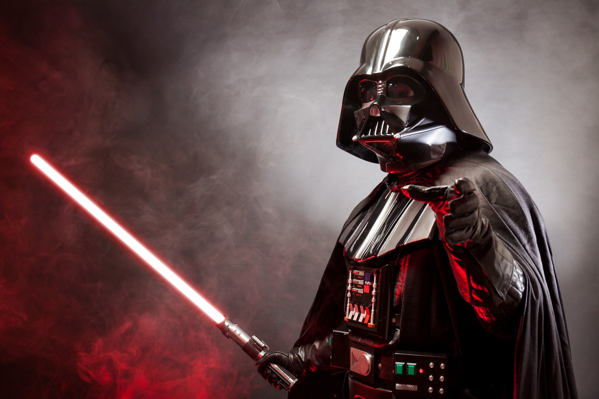Darth Vader from Star Wars with a red lightsaber HD Wallpaper