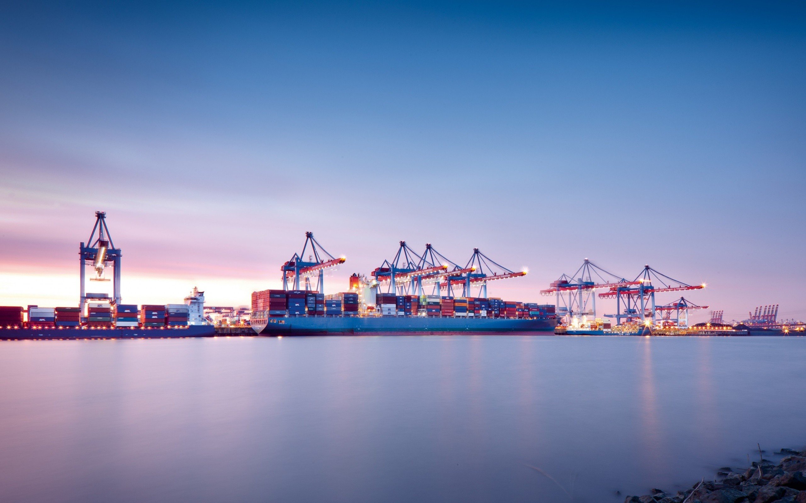 Container ships and cranes at Hamburg port at dusk HD Wallpaper