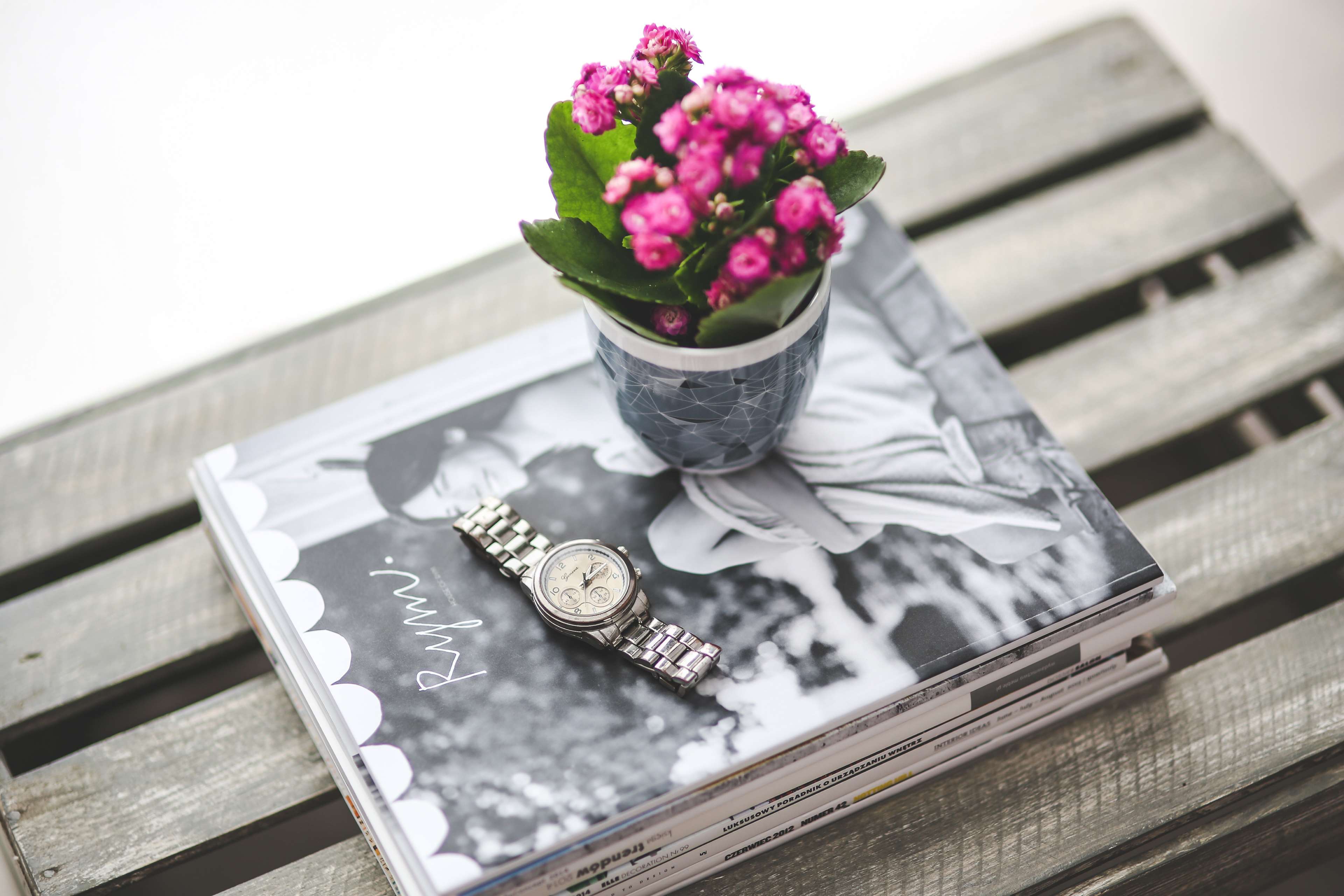 Watch on Magazine with Pink Flowers HD Wallpaper