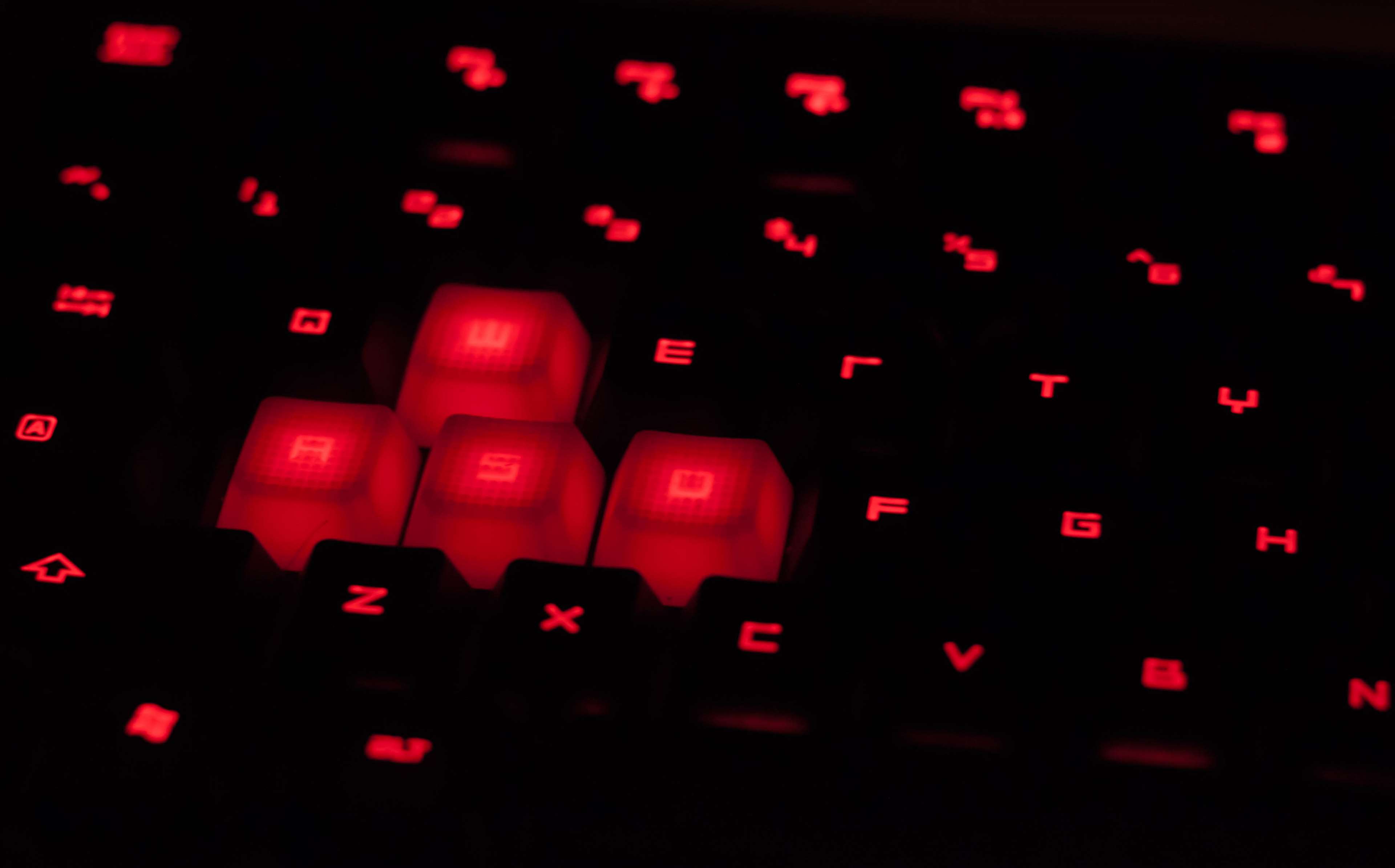 Red backlit gaming keyboard HD Wallpaper