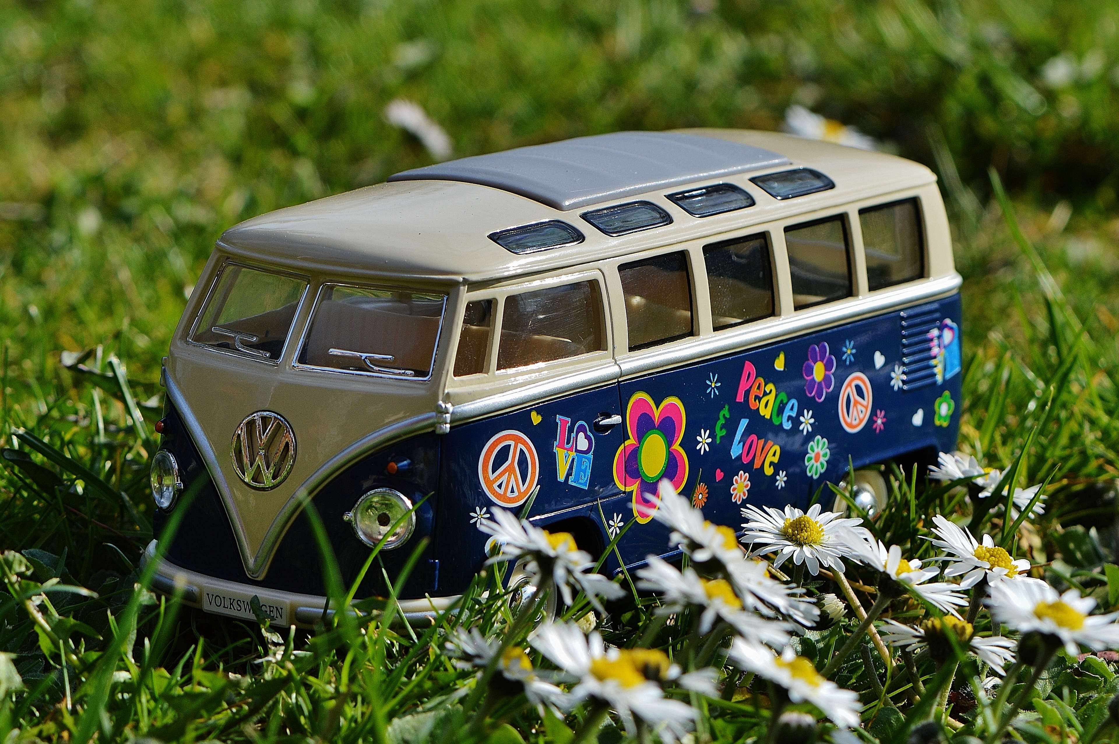 Volkswagen Bus toy car with peace and love decorations HD Wallpaper