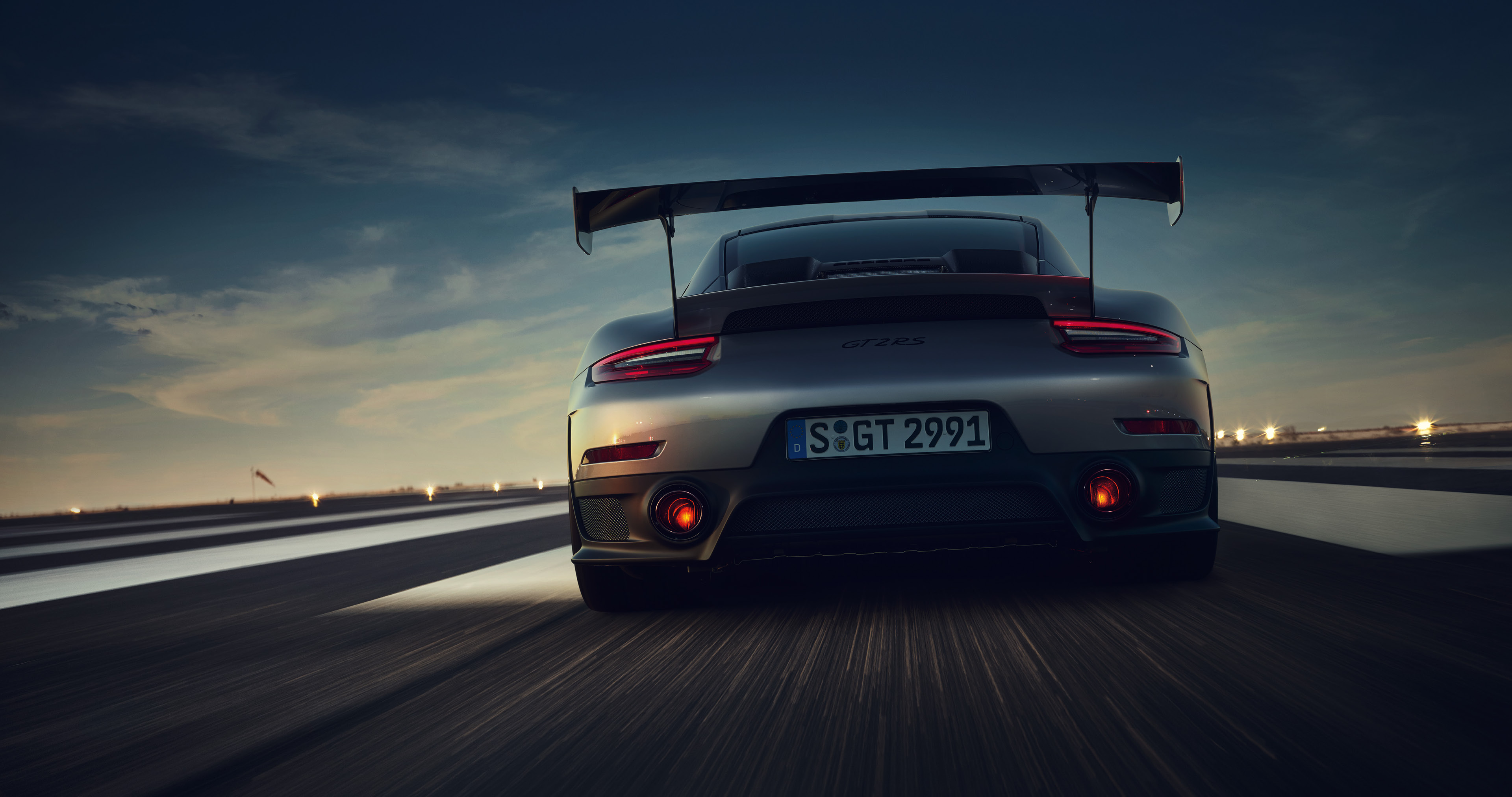 Porsche 911 GT2 RS on a runway HD Wallpaper
