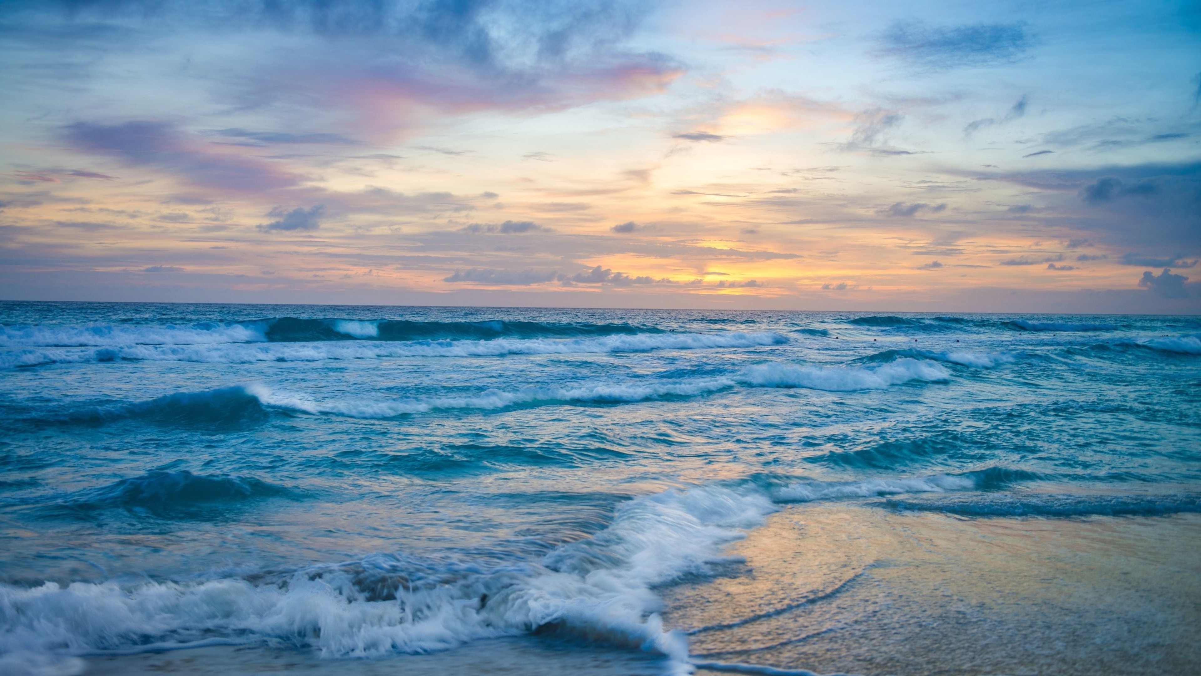 Ocean waves at sunset HD Wallpaper