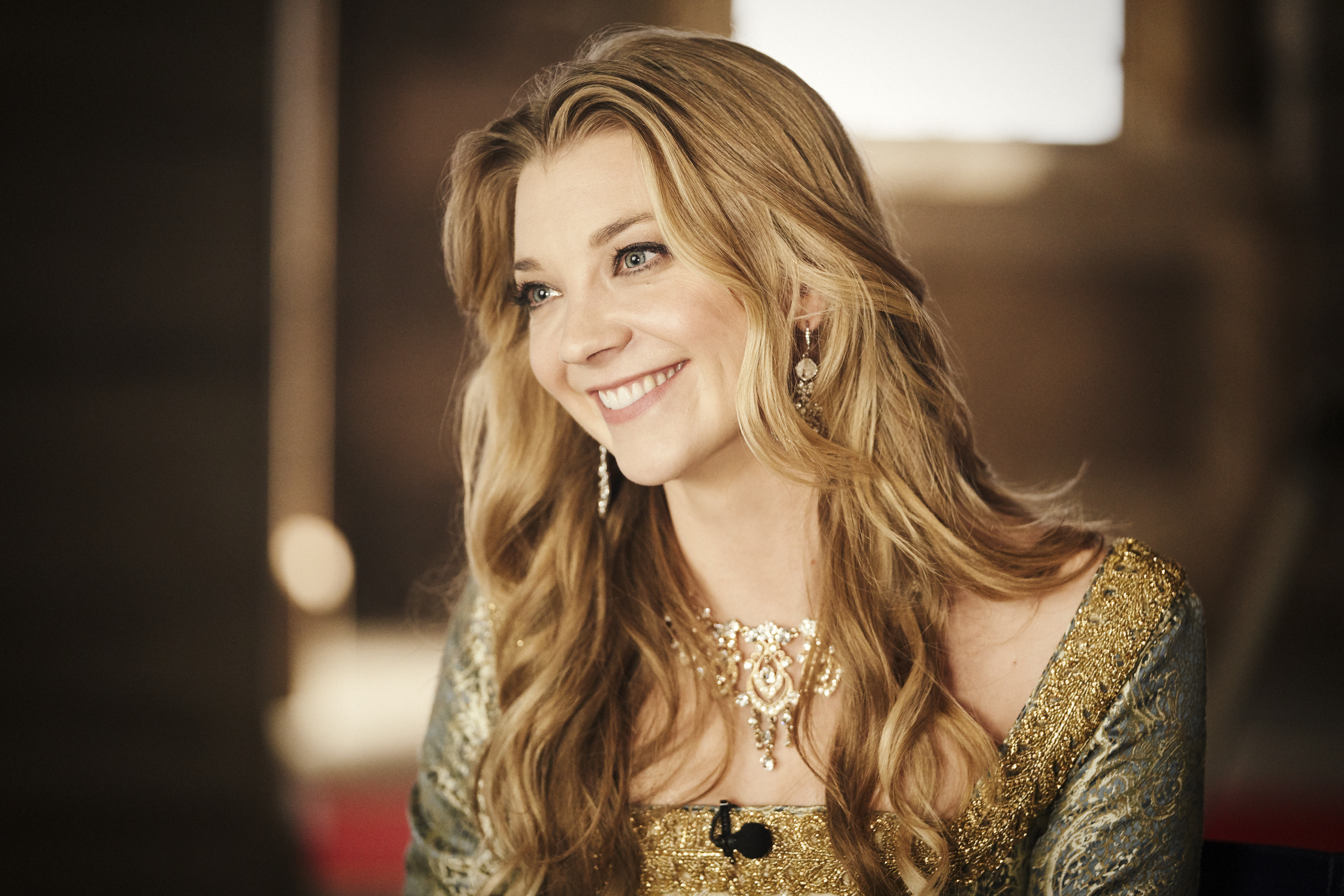 Natalie Dormer Smiling Elegantly in Gold Dress 4K HD Wallpaper